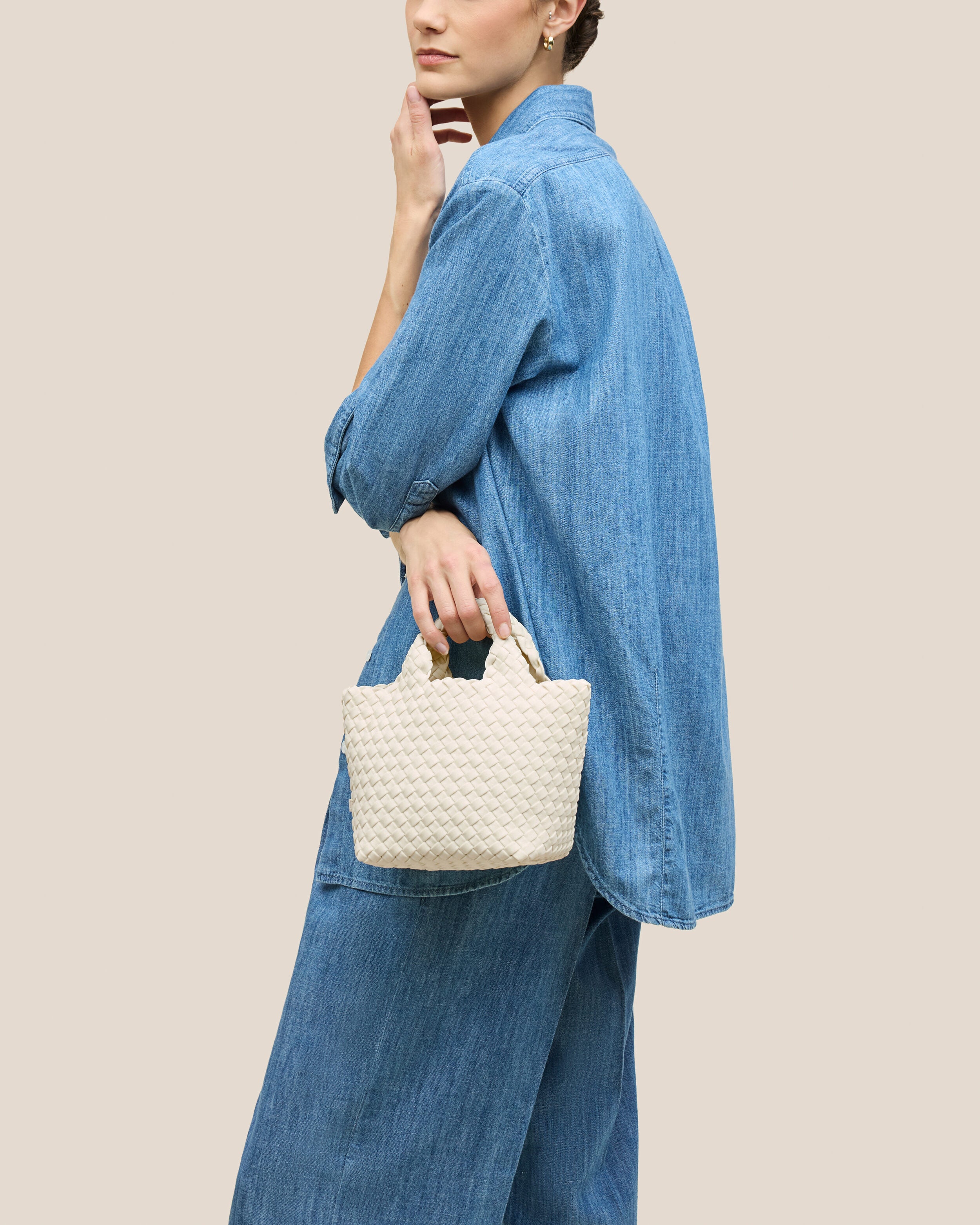 St. Barths Tote in Jasmine shown on model to illustrate scale and soft silhouette.