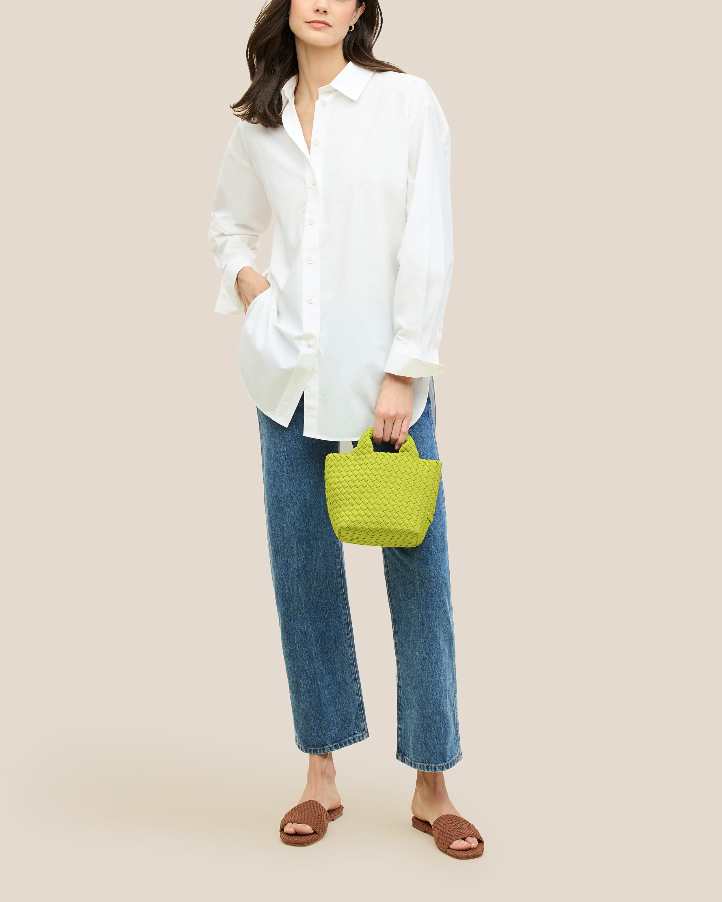 St. Barths Tote in Matcha shown on model to illustrate scale and soft silhouette.