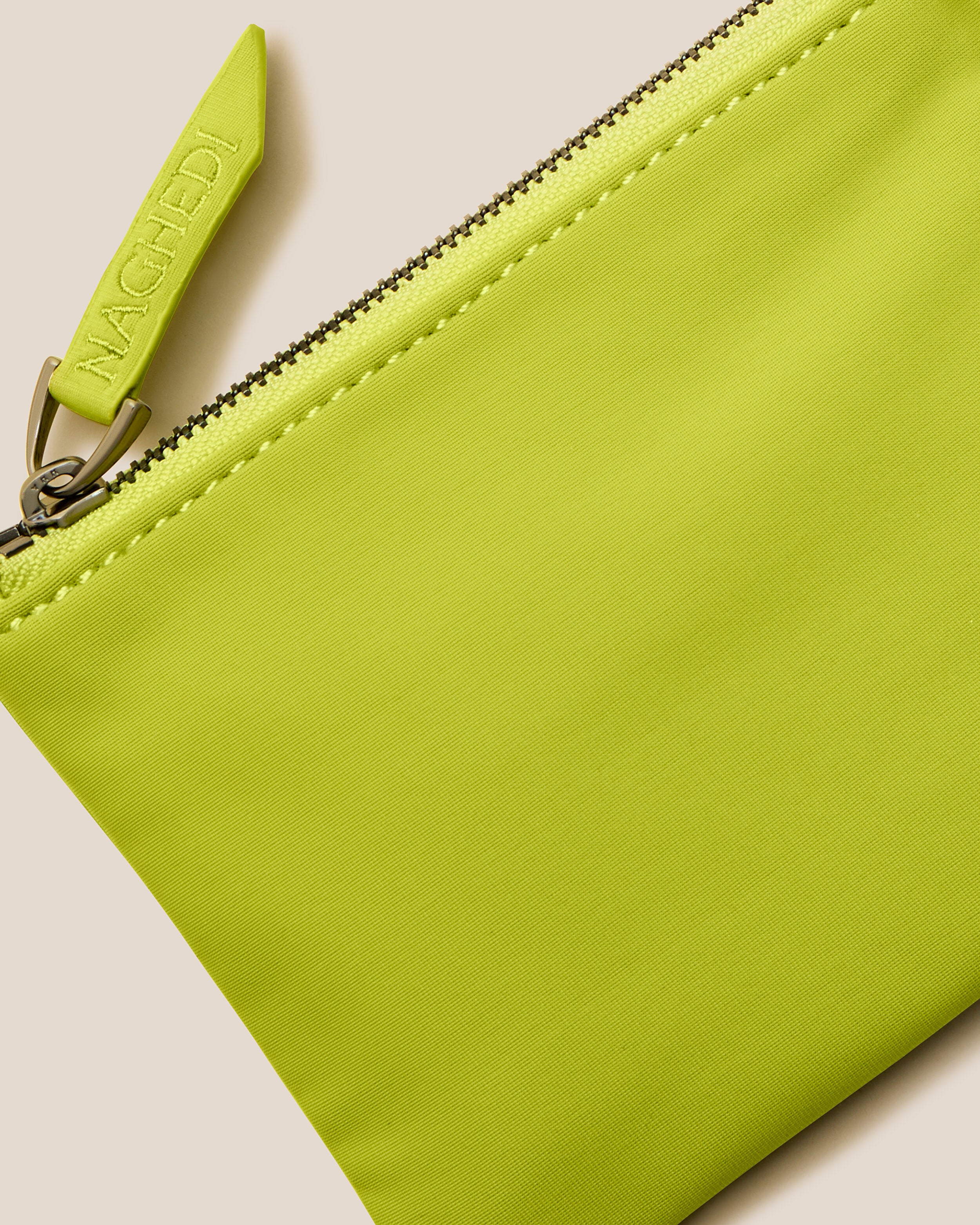 Close-up of included coordinating neoprene zippered pouch.
