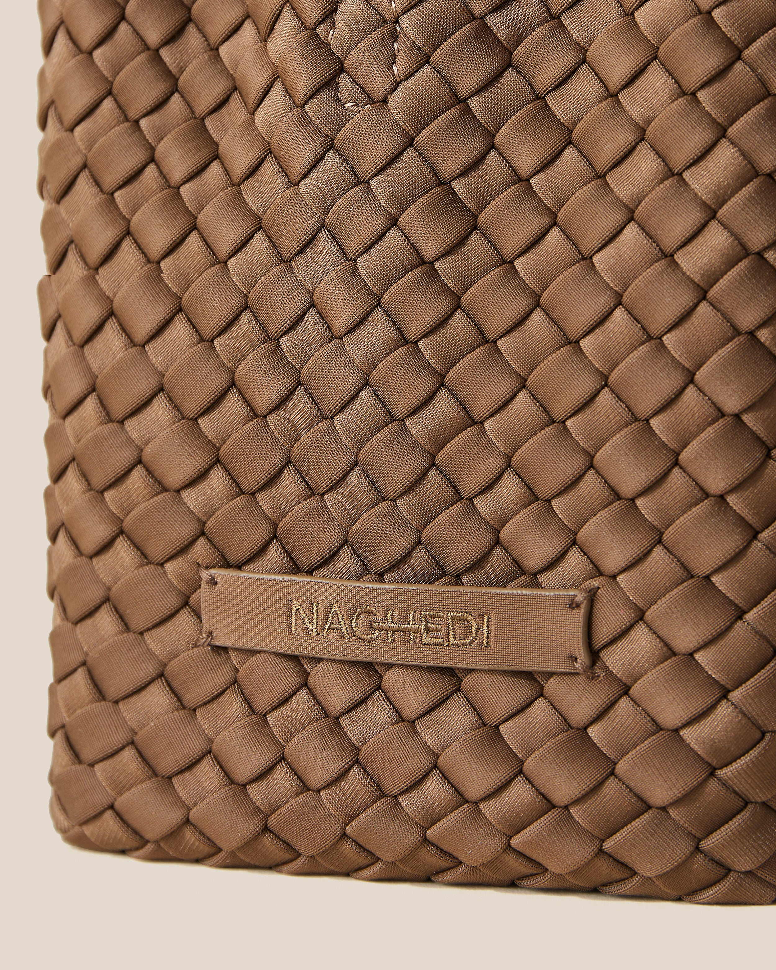 Close-up of stamped NAGHEDI logo on St. Barths Tote in Mink.