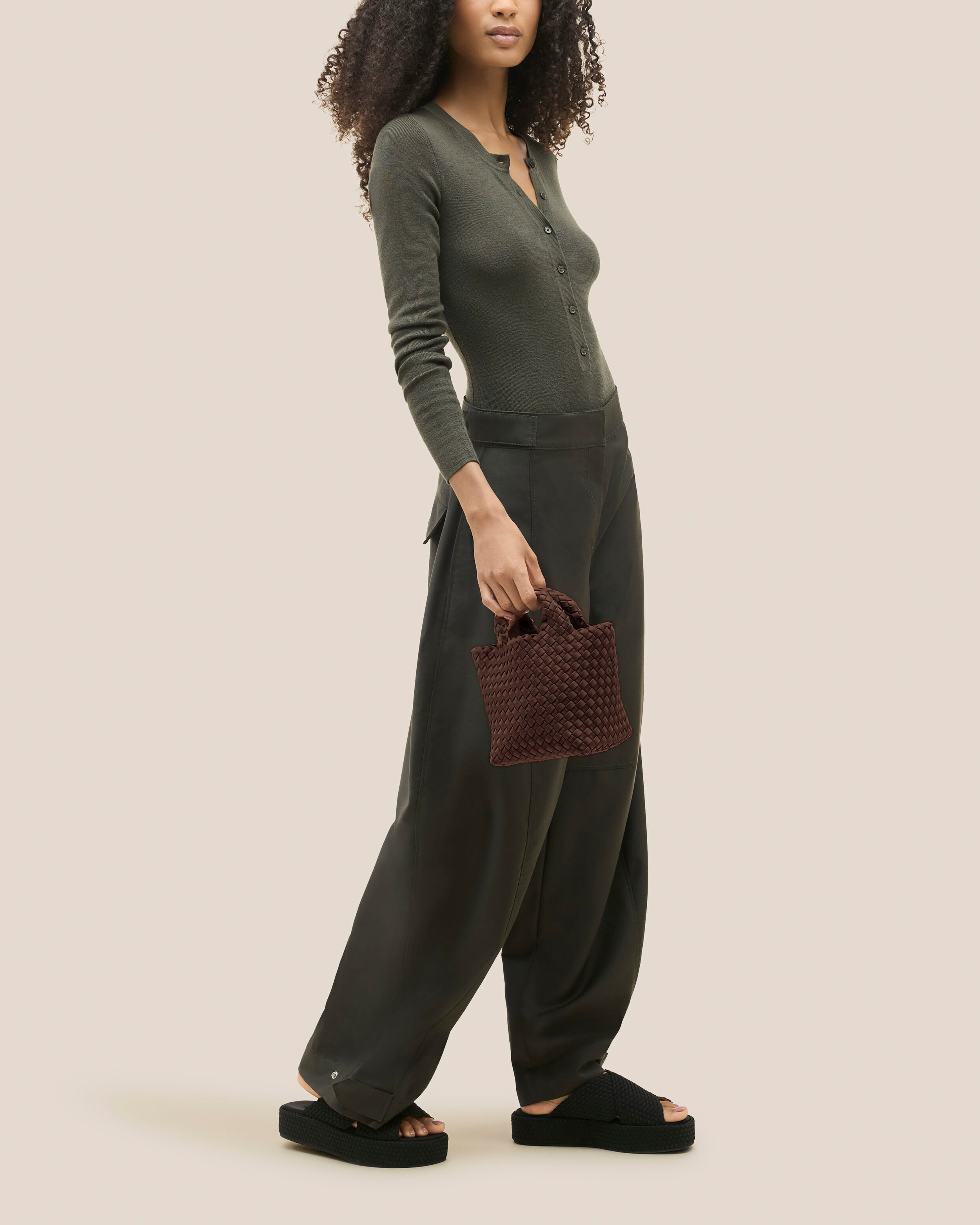 St. Barths Tote in Mocha shown on model to illustrate scale and soft silhouette.
