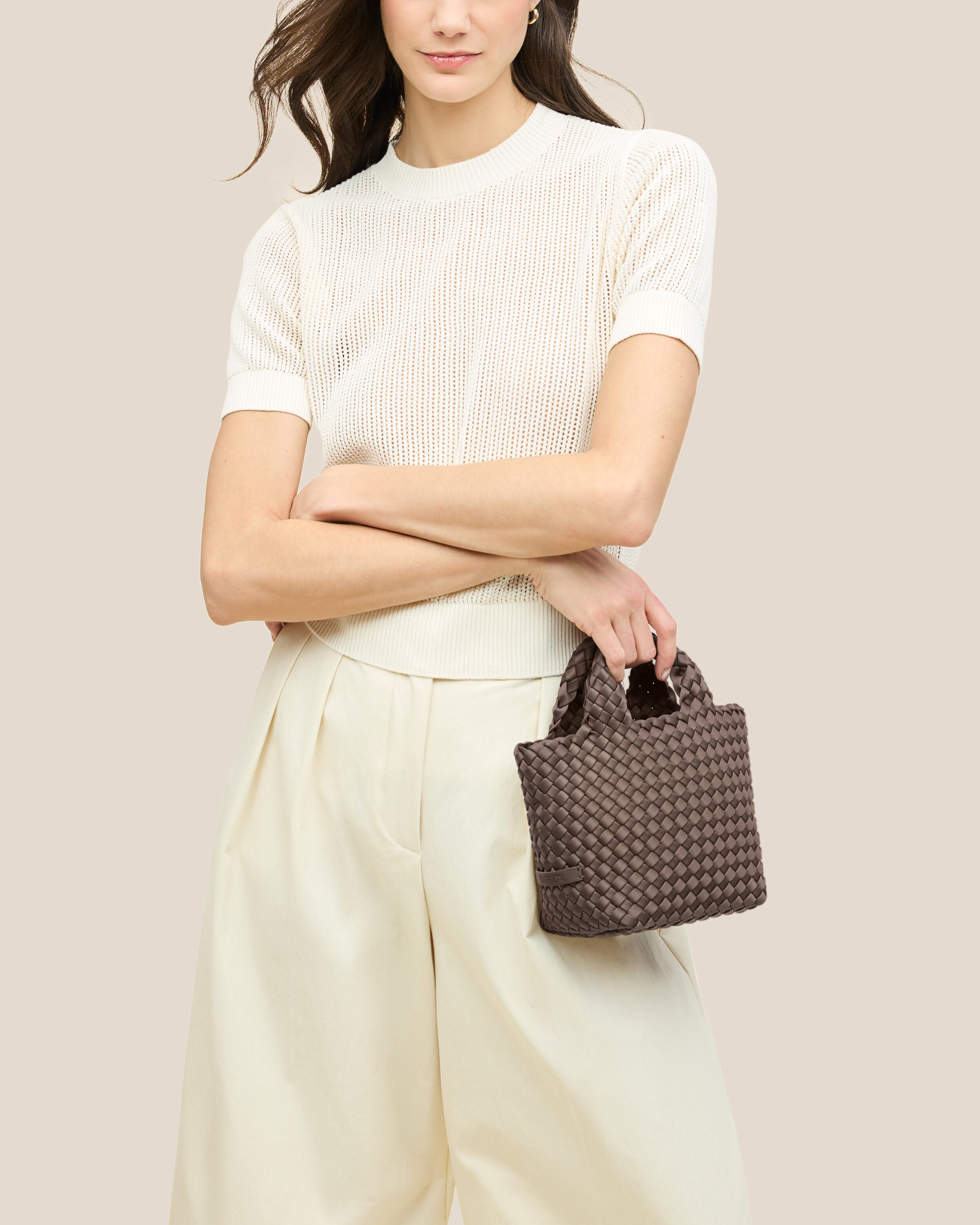 St. Barths Tote in Napa shown on model to illustrate scale and soft silhouette.