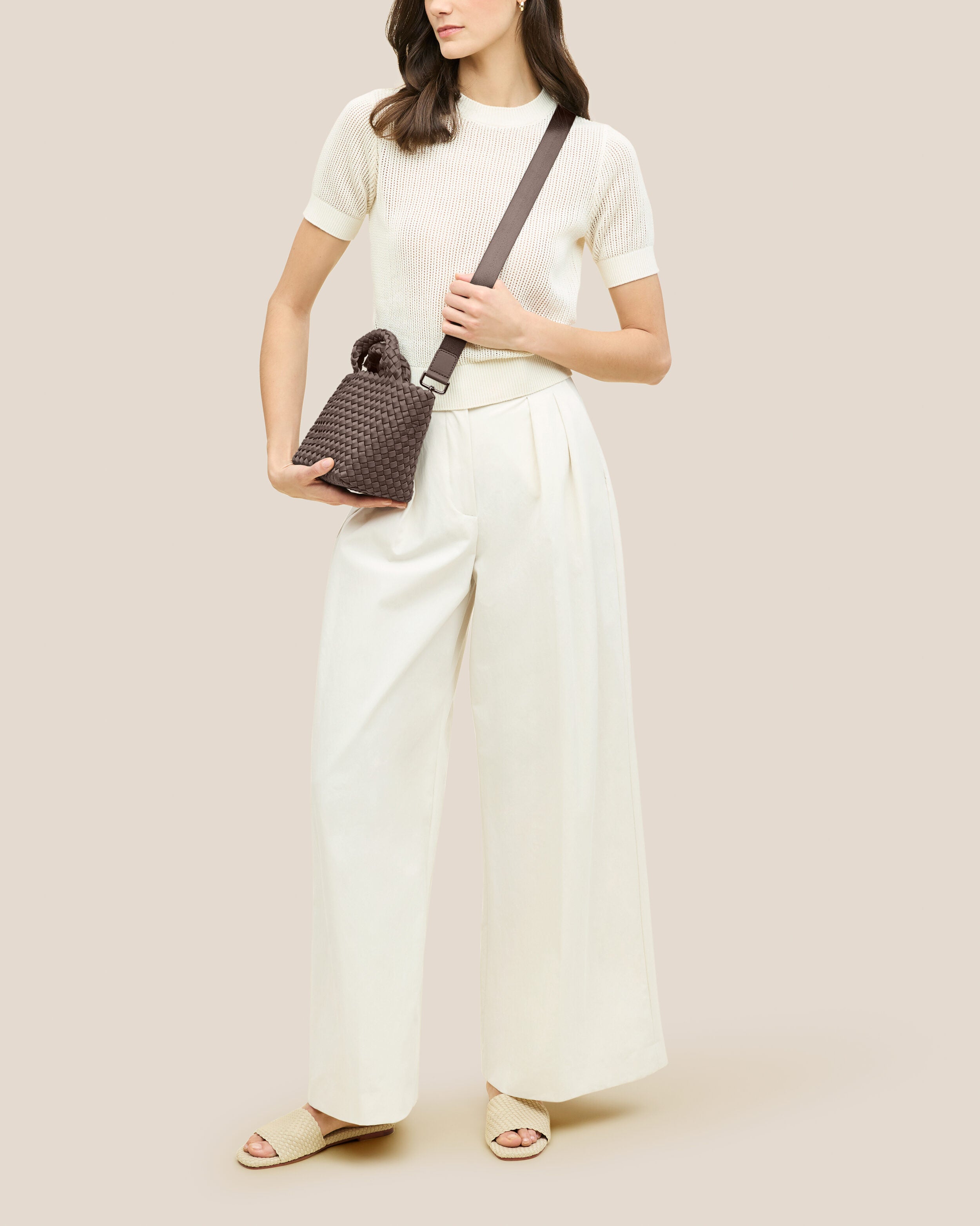 St. Barths Tote in Napa shown on model to illustrate scale and soft silhouette.