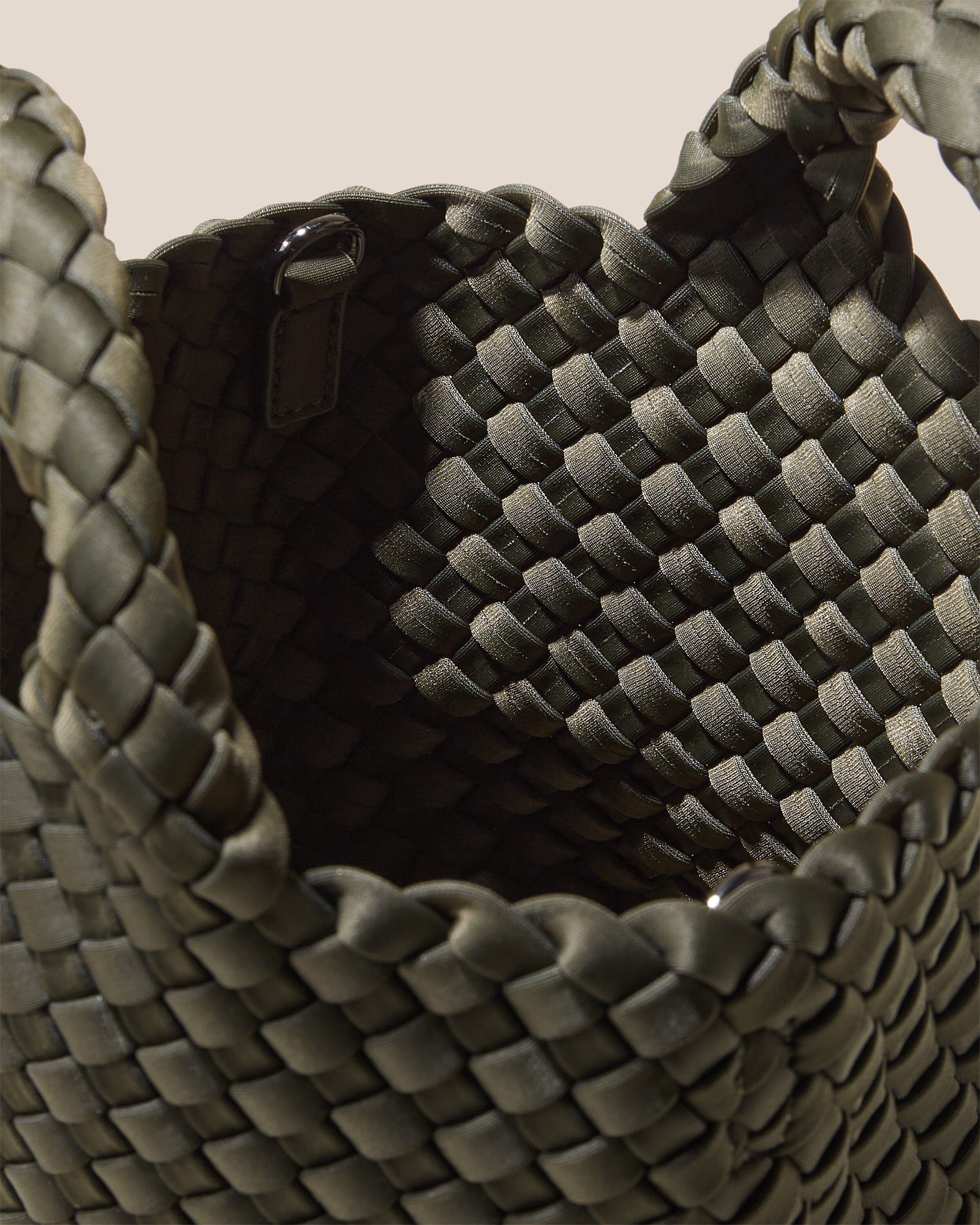 Interior close-up of St. Barths Tote in Olive showing its open top, and unlined interior.