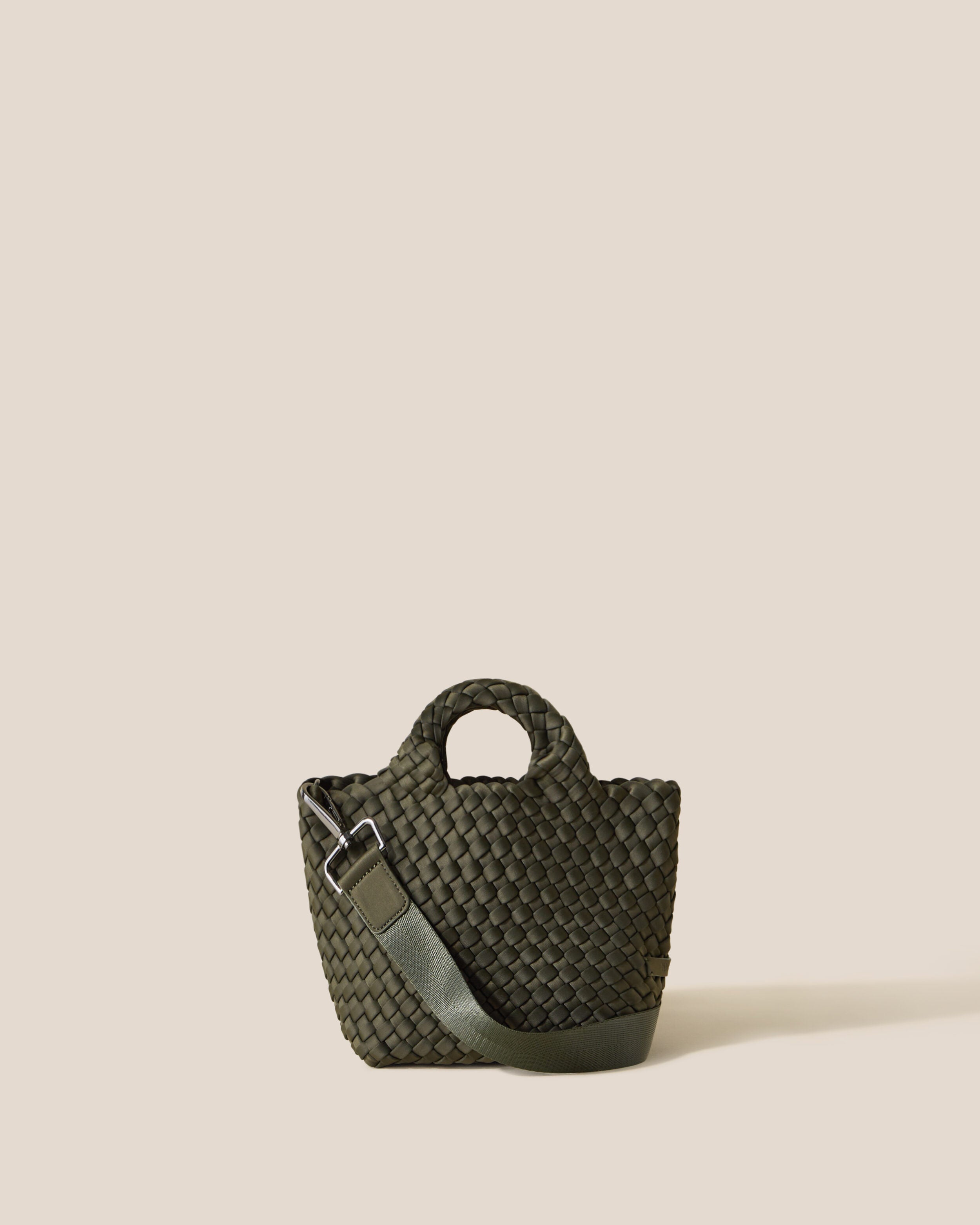 St. Barths Tote in Olive, an olive green tone, in handwoven neoprene, featuring an open top, woven top handles, and detachable, adjustable nylon crossbody strap.