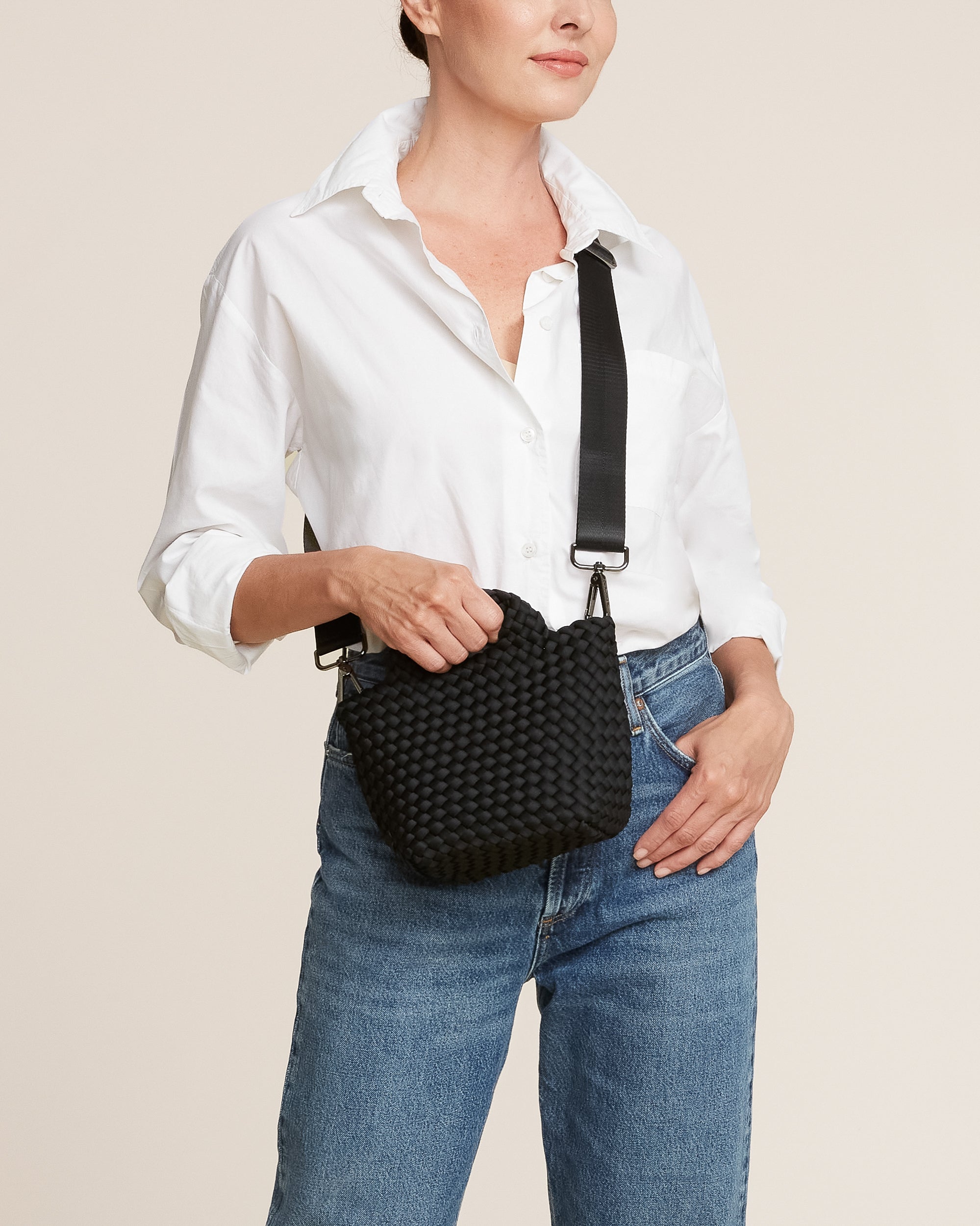 St. Barths Petit Tote Bag in Onyx shown on model to illustrate scale and soft silhouette.