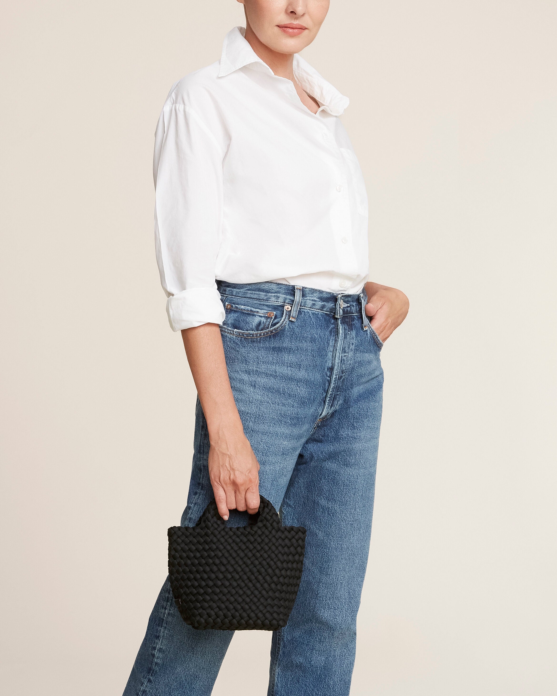 St. Barths Tote in Onyx shown on model to illustrate scale and soft silhouette.