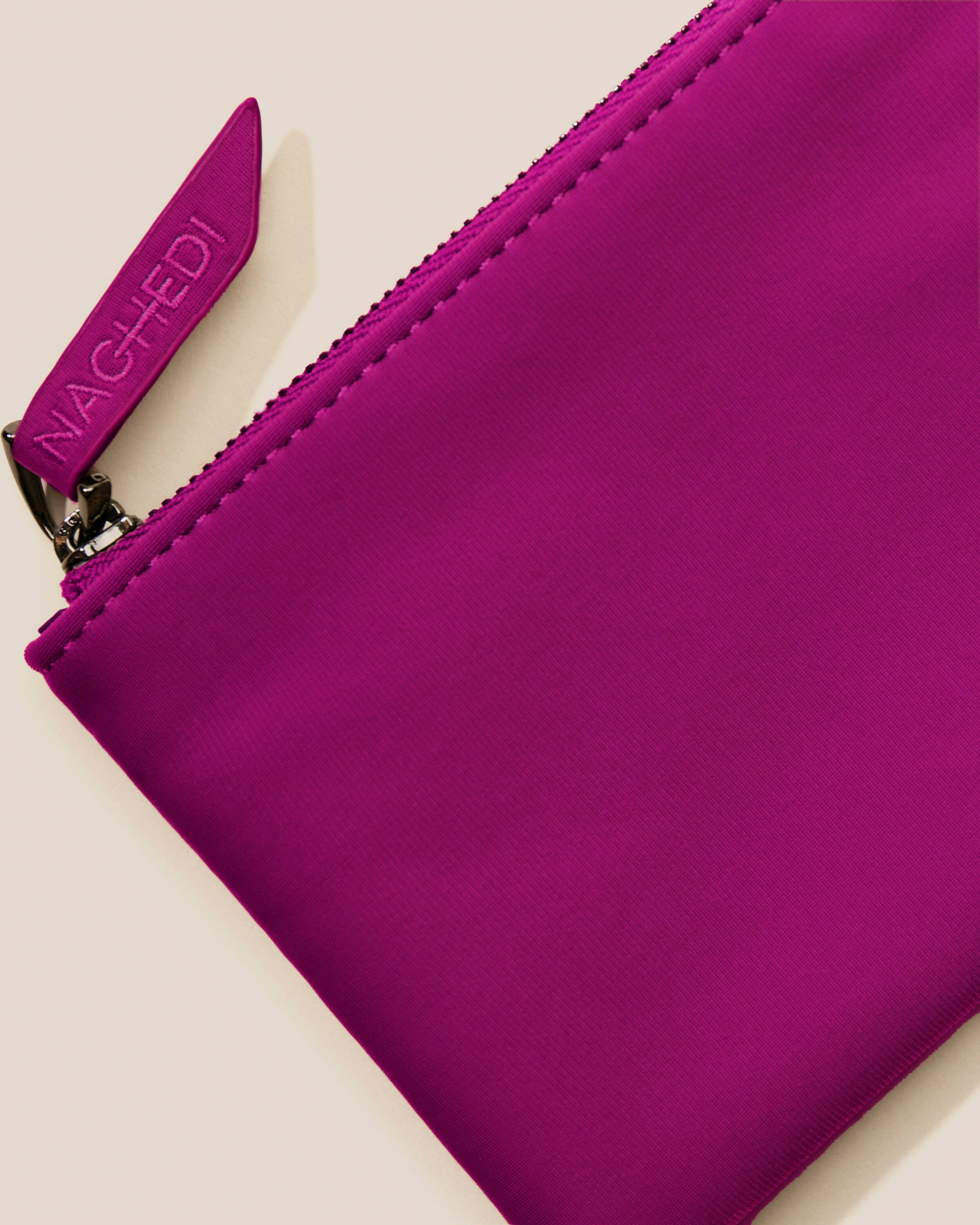 Close-up of included coordinating neoprene zippered pouch.