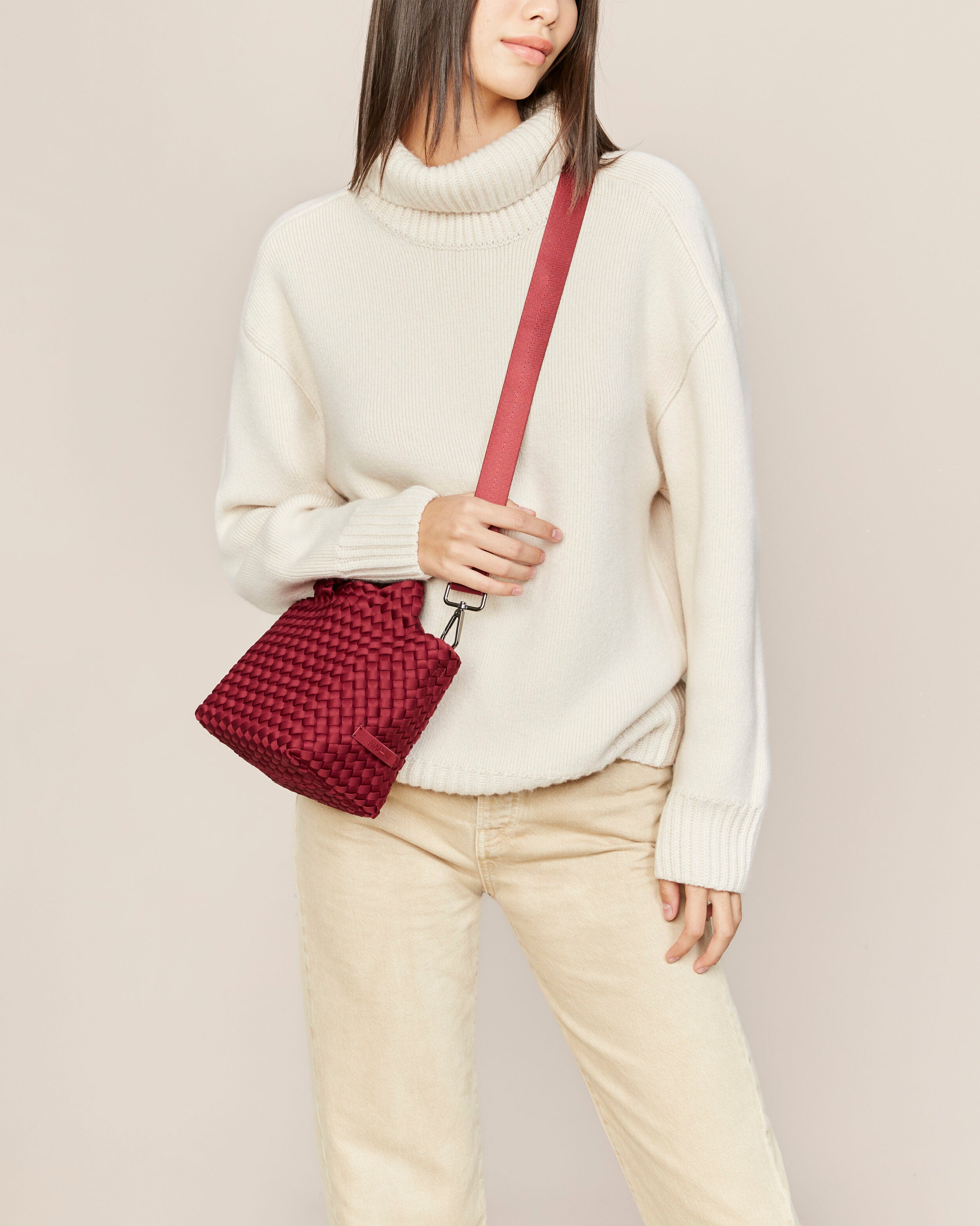 St. Barths Tote in Rosewood shown on model to illustrate scale and soft silhouette.