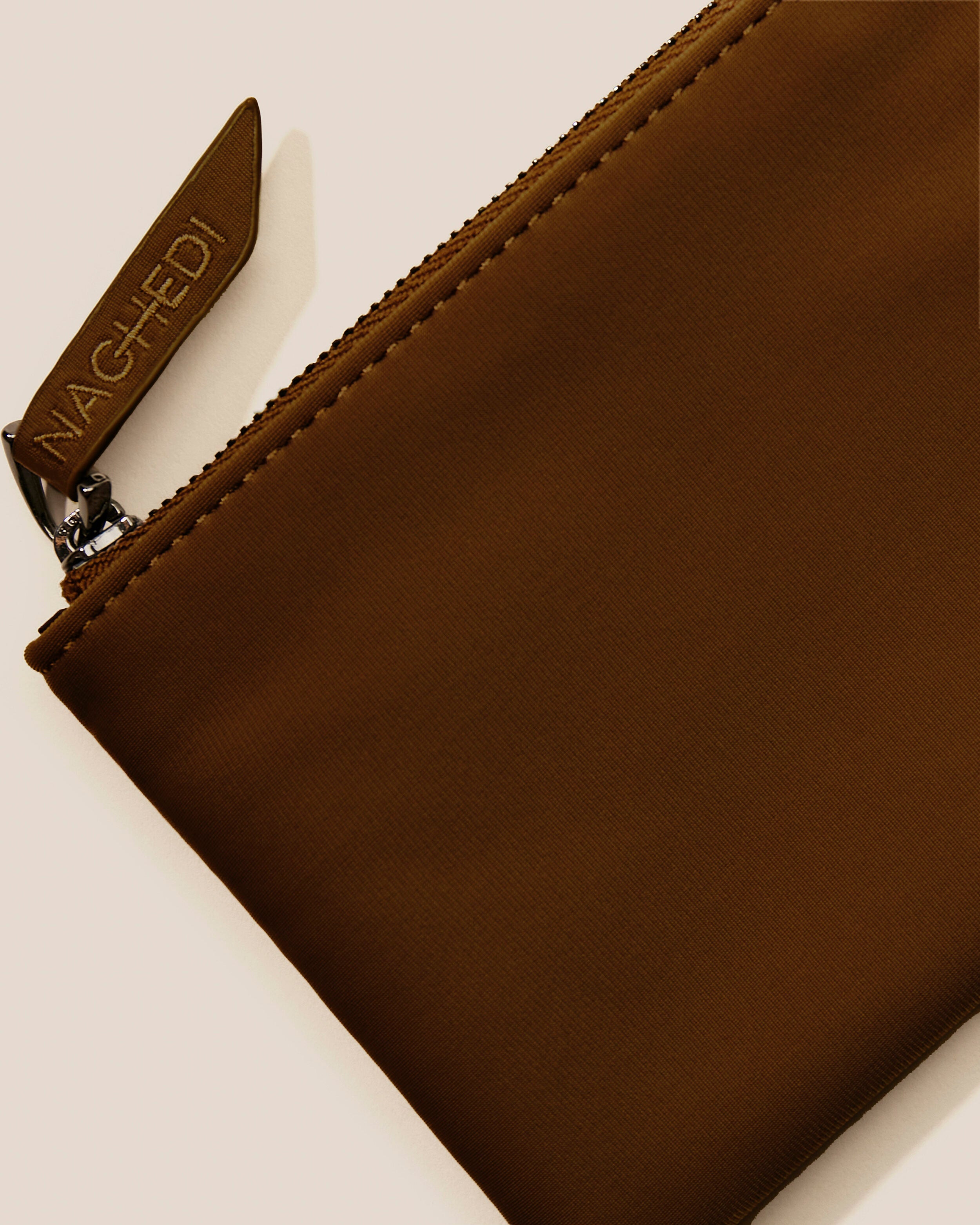 Close-up of included coordinating neoprene zippered pouch.