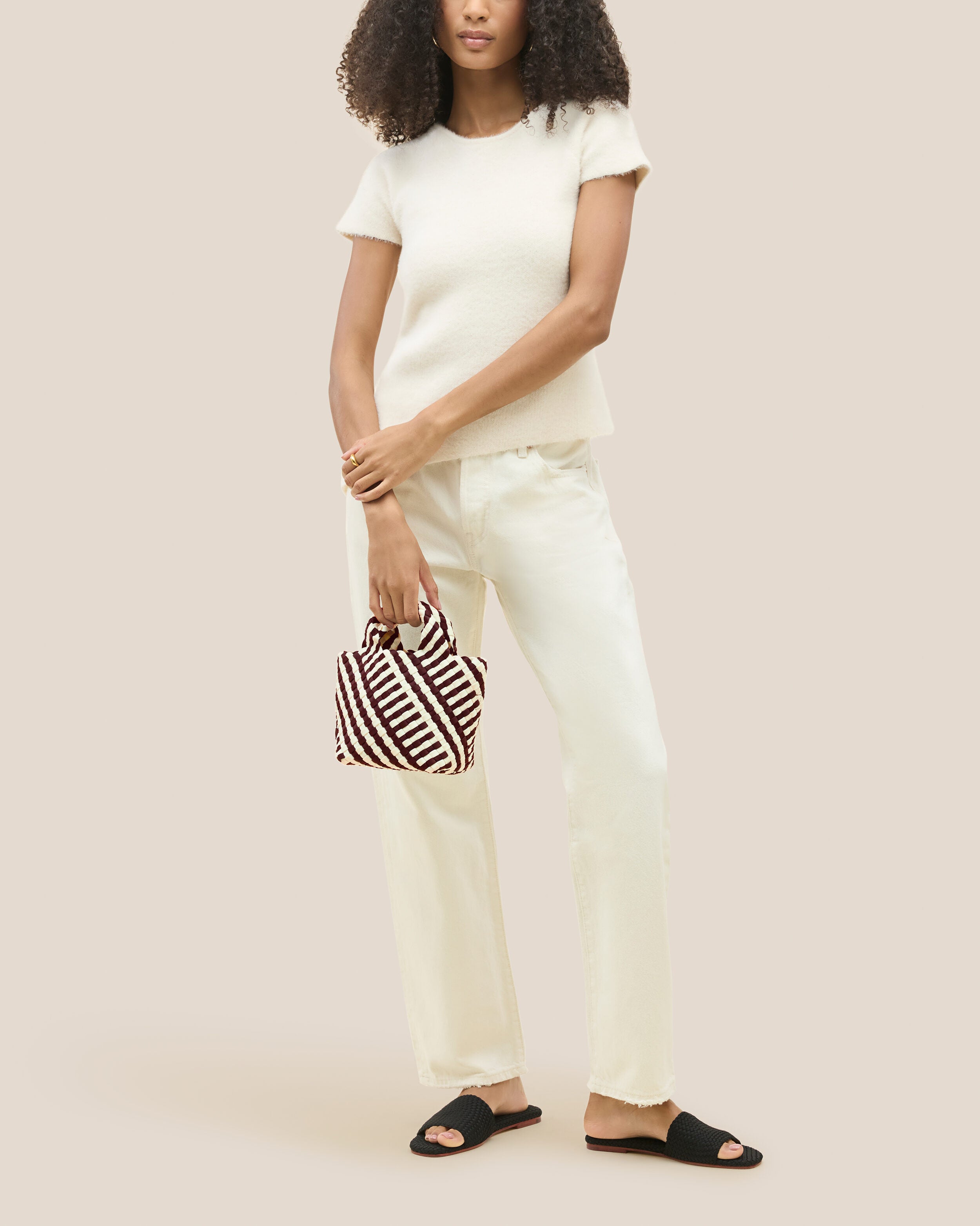 St. Barths Tote in Roma shown on model to illustrate scale and soft silhouette.