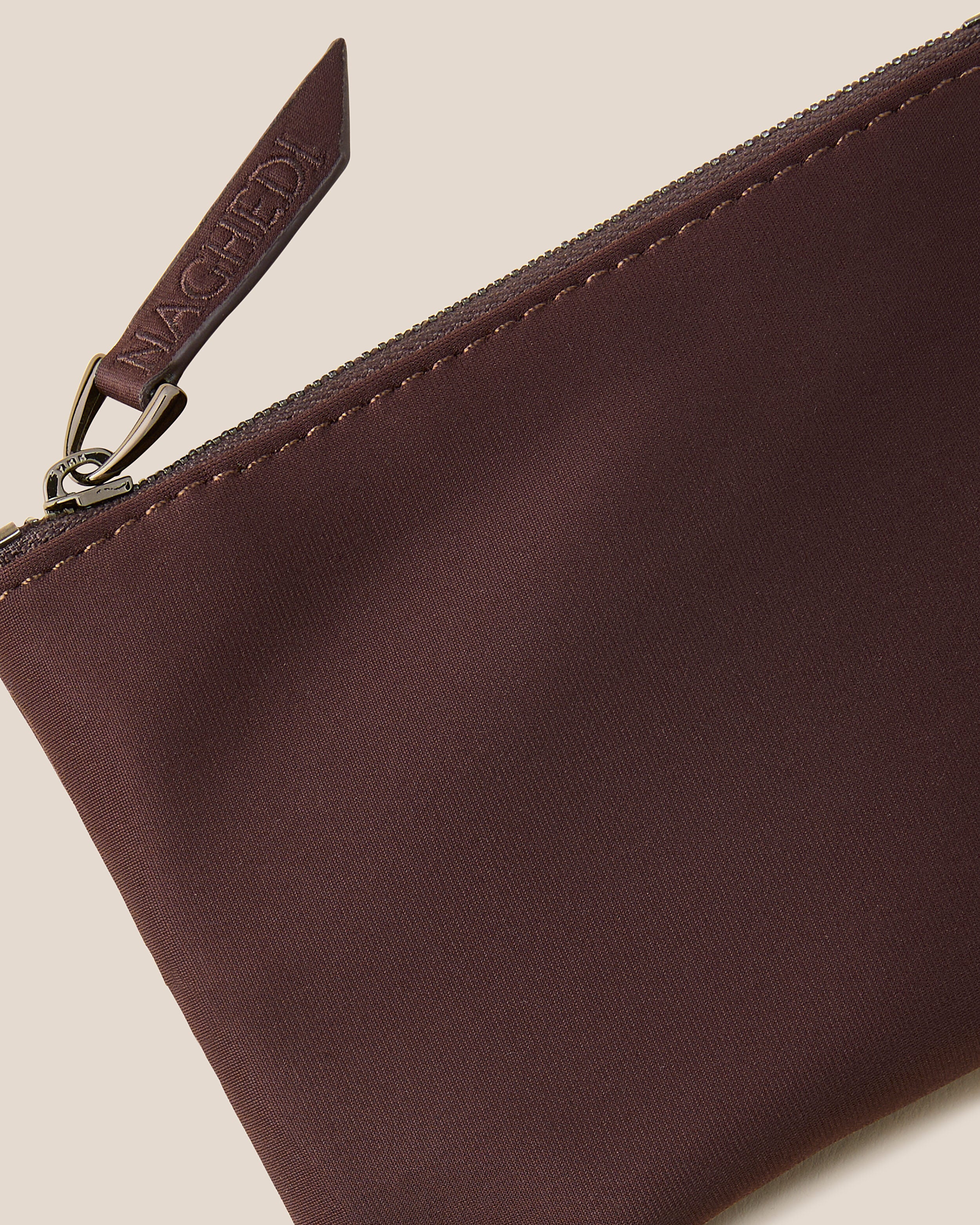 Close-up of included coordinating neoprene zippered pouch.