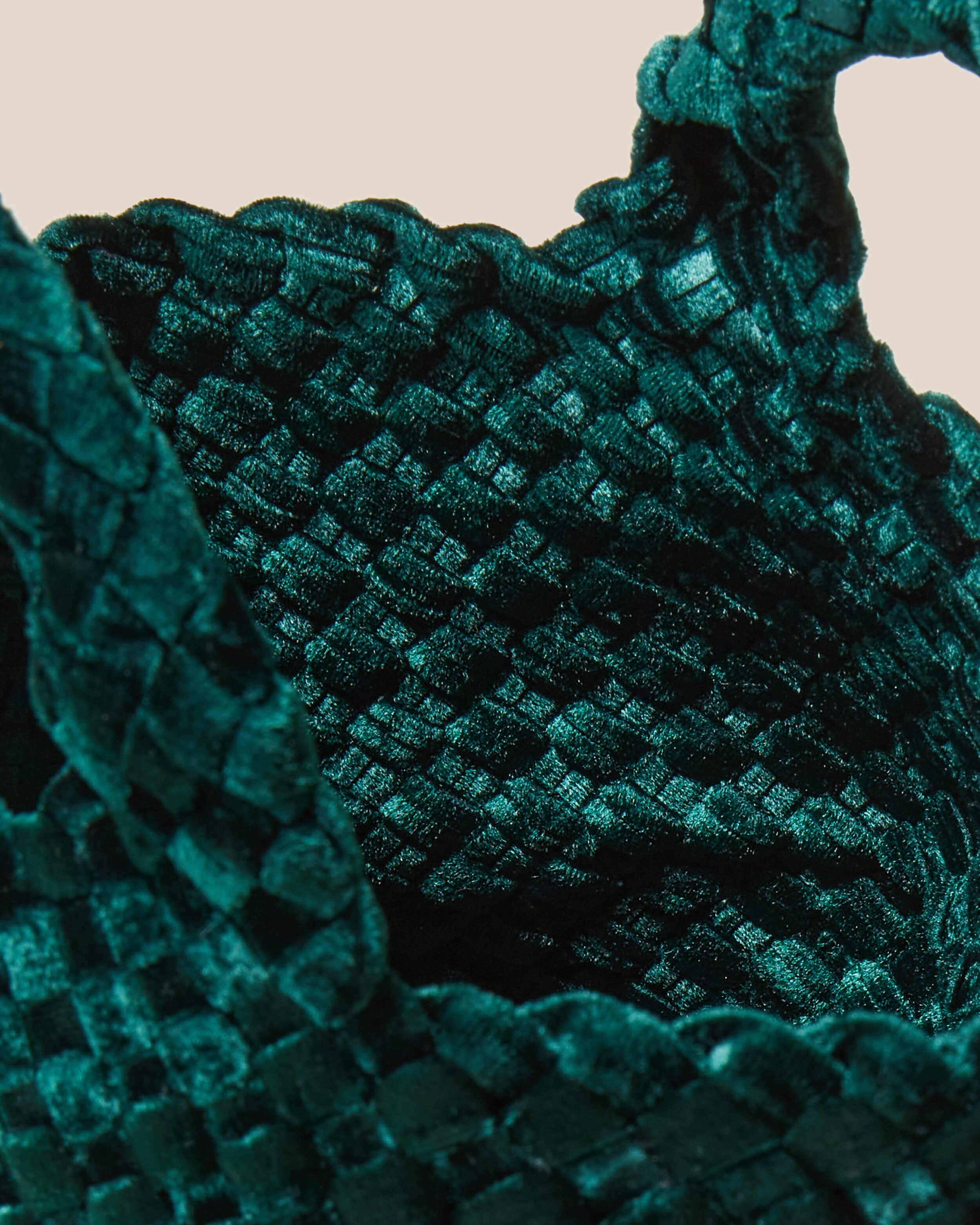 Interior close-up of St. Barths Tote in Emerald showing its open top, and unlined interior.