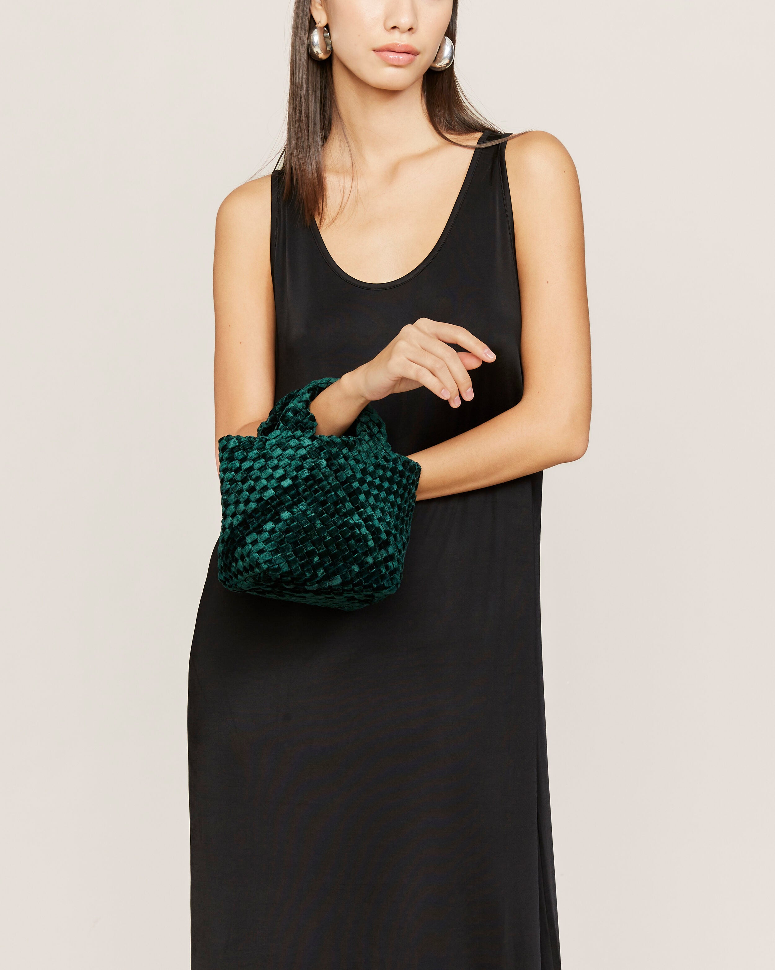 St. Barths Tote in Emerald shown on model to illustrate scale and soft silhouette.