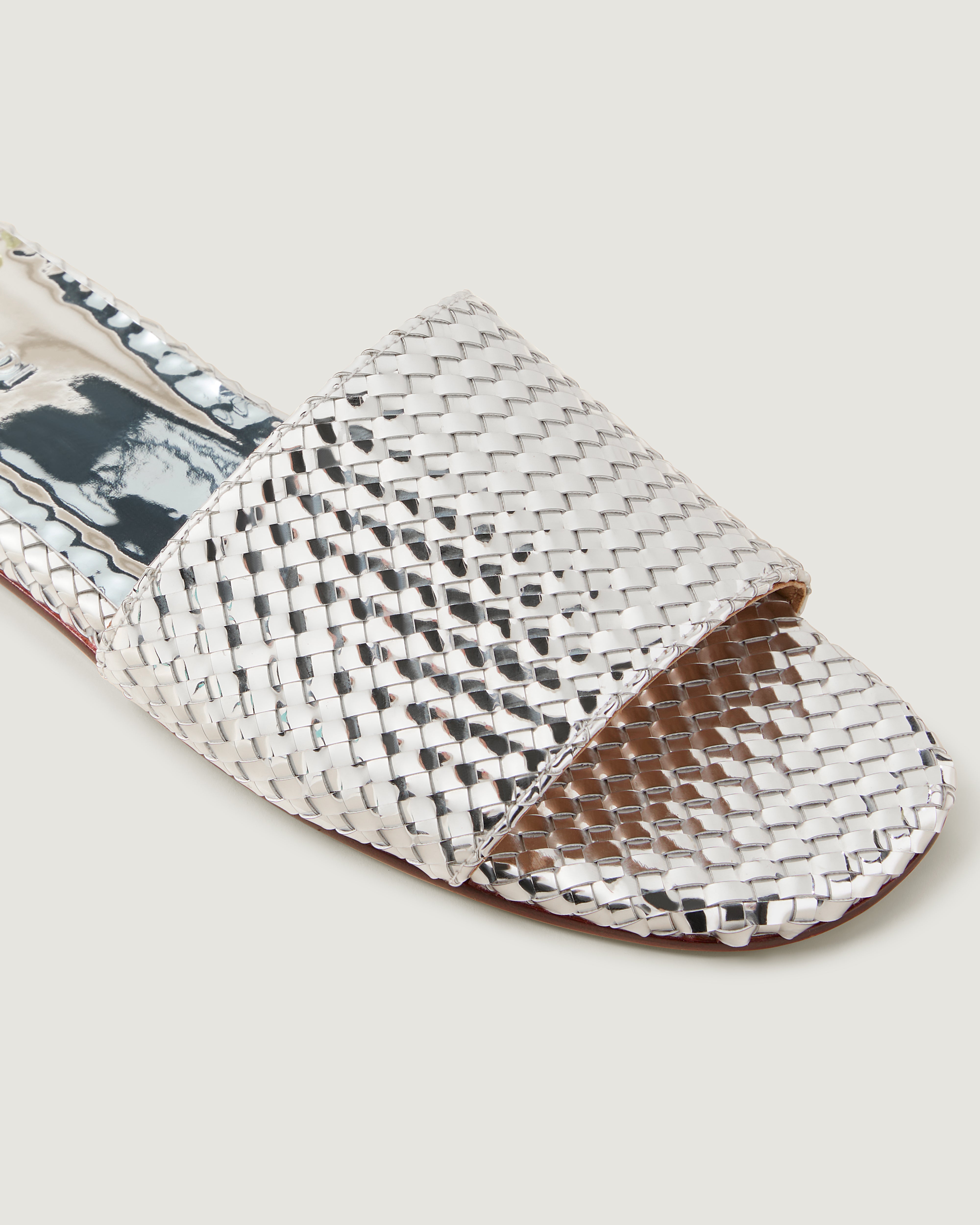 Close-up of The St. Barths Slide in Silver showing its open toe and square silhouette.