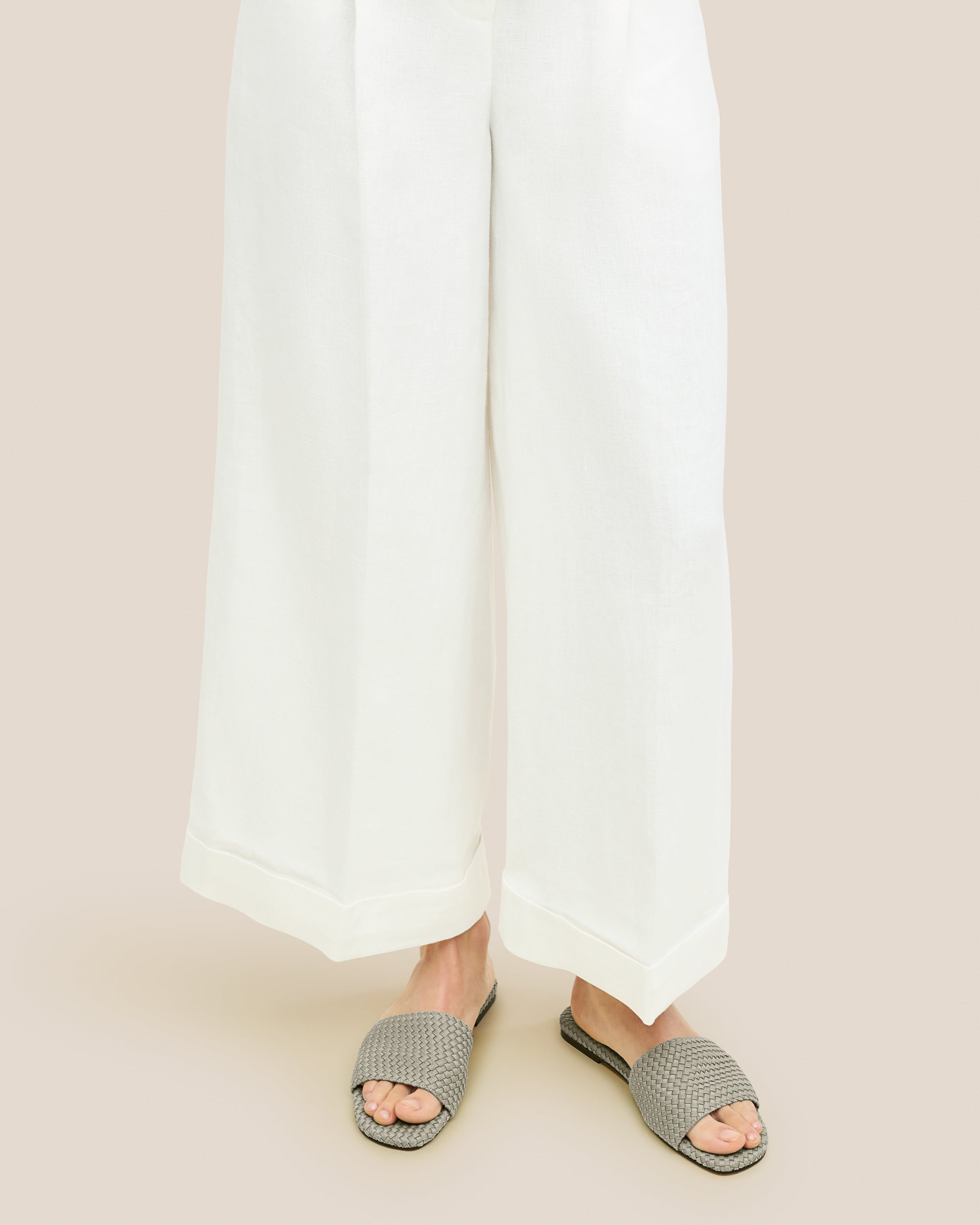 St. Barths Slide Sandals in Celadon shown on model.