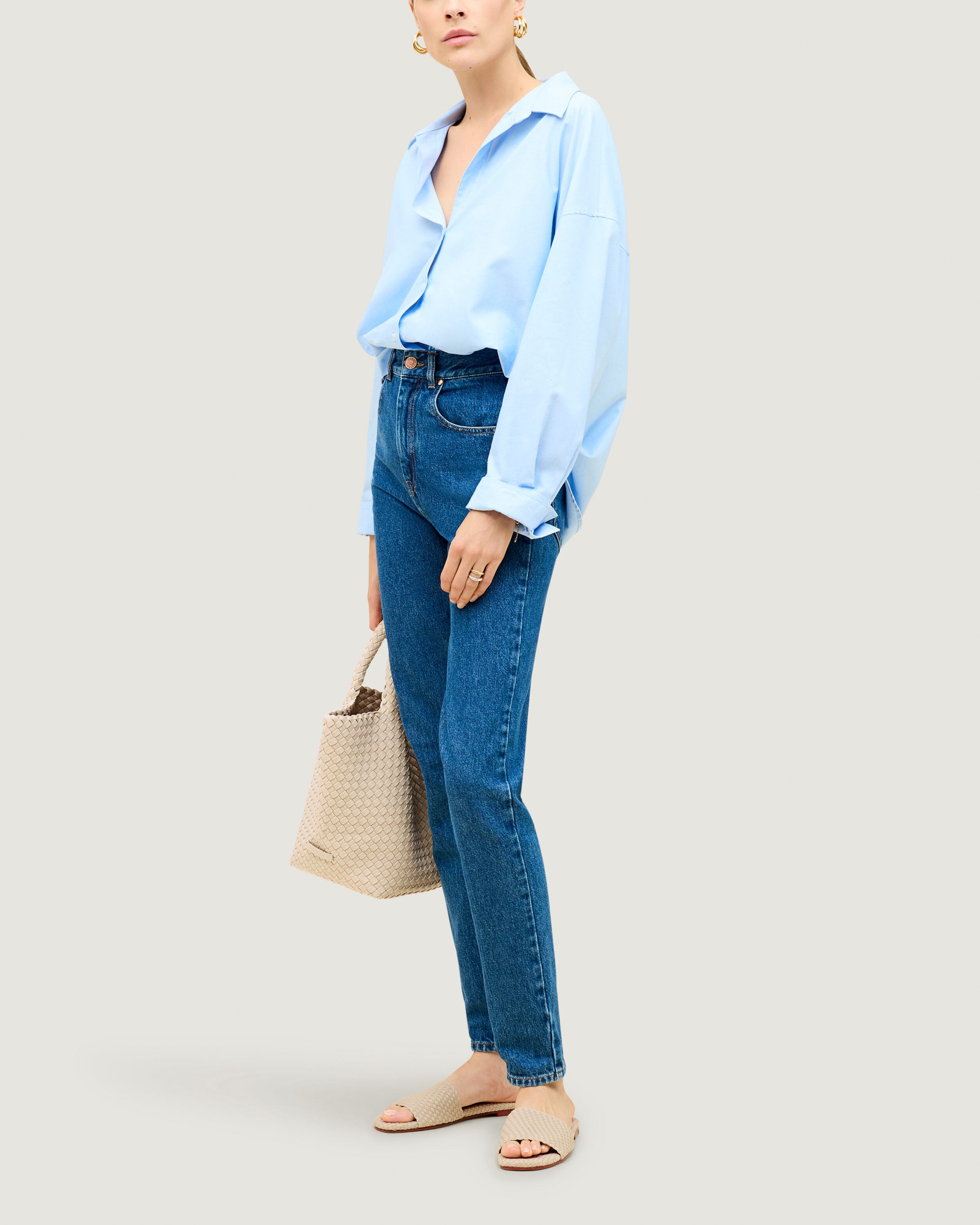 The St. Barths Slide in Ecru shown on model.