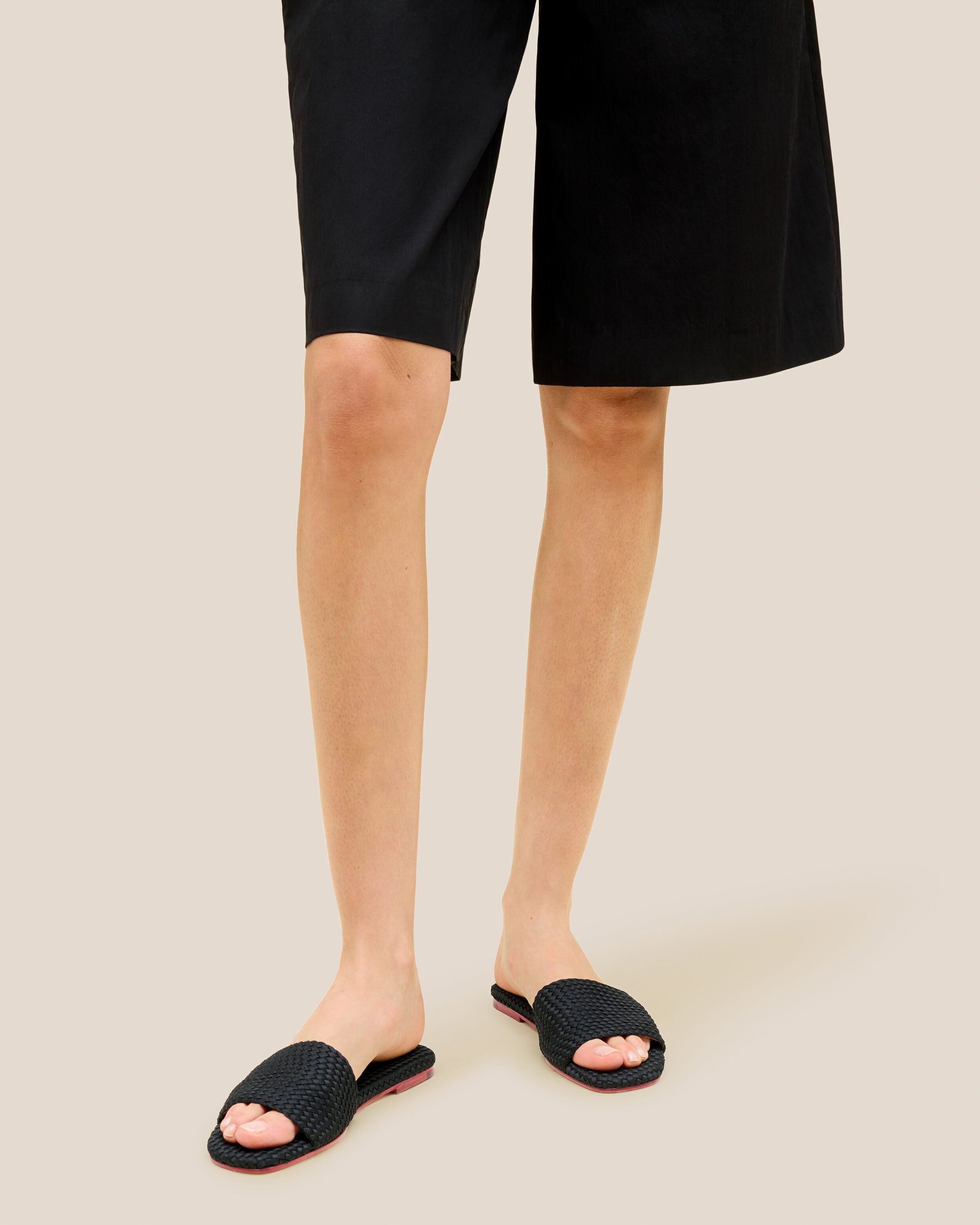 The St. Barths Slide in Onyx shown on model.