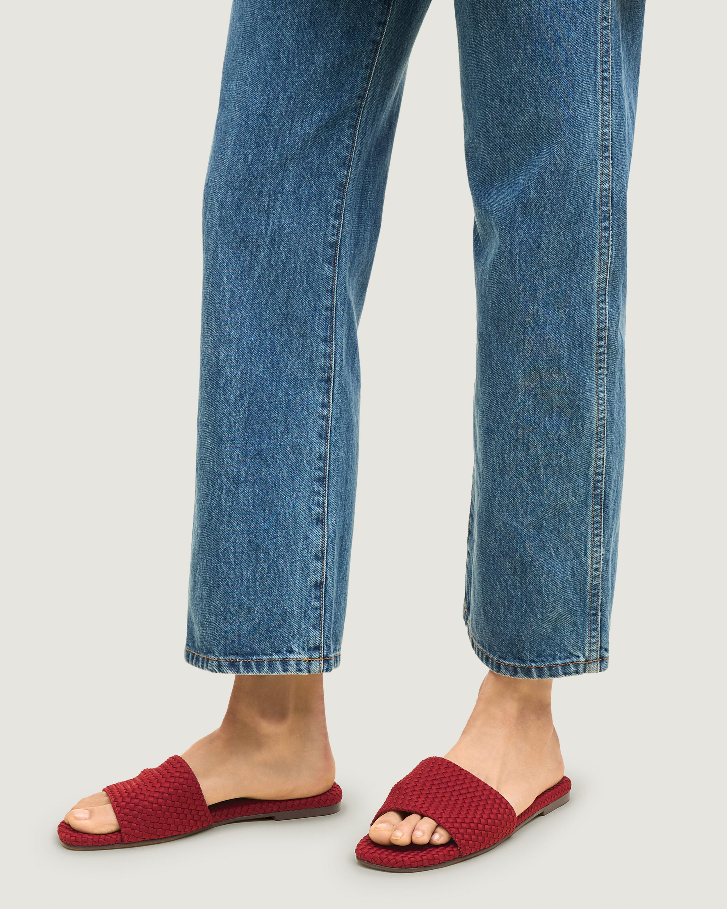 The St. Barths Slide in Rosso shown on model.