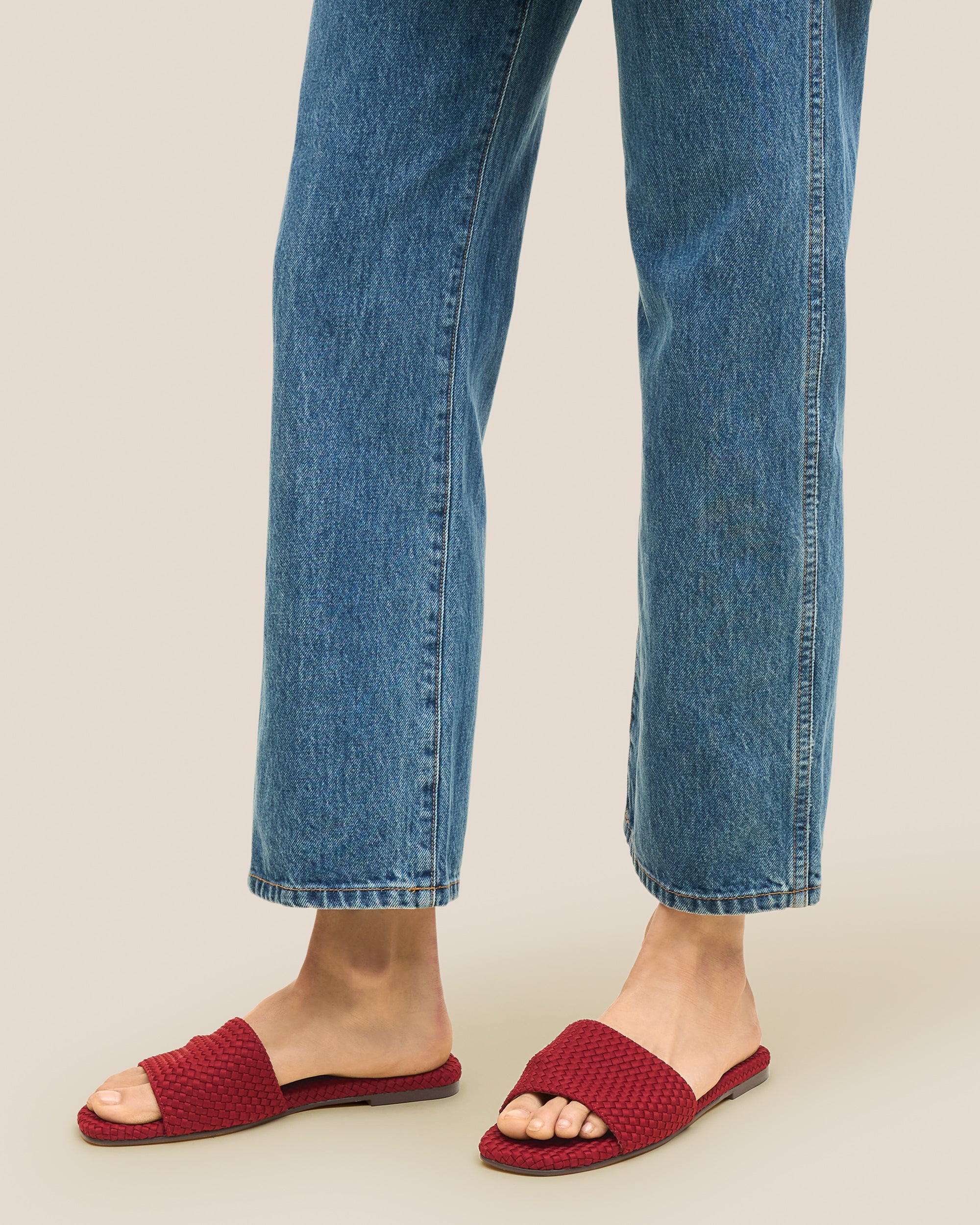St. Barths Slide Sandals in Rosso shown on model.