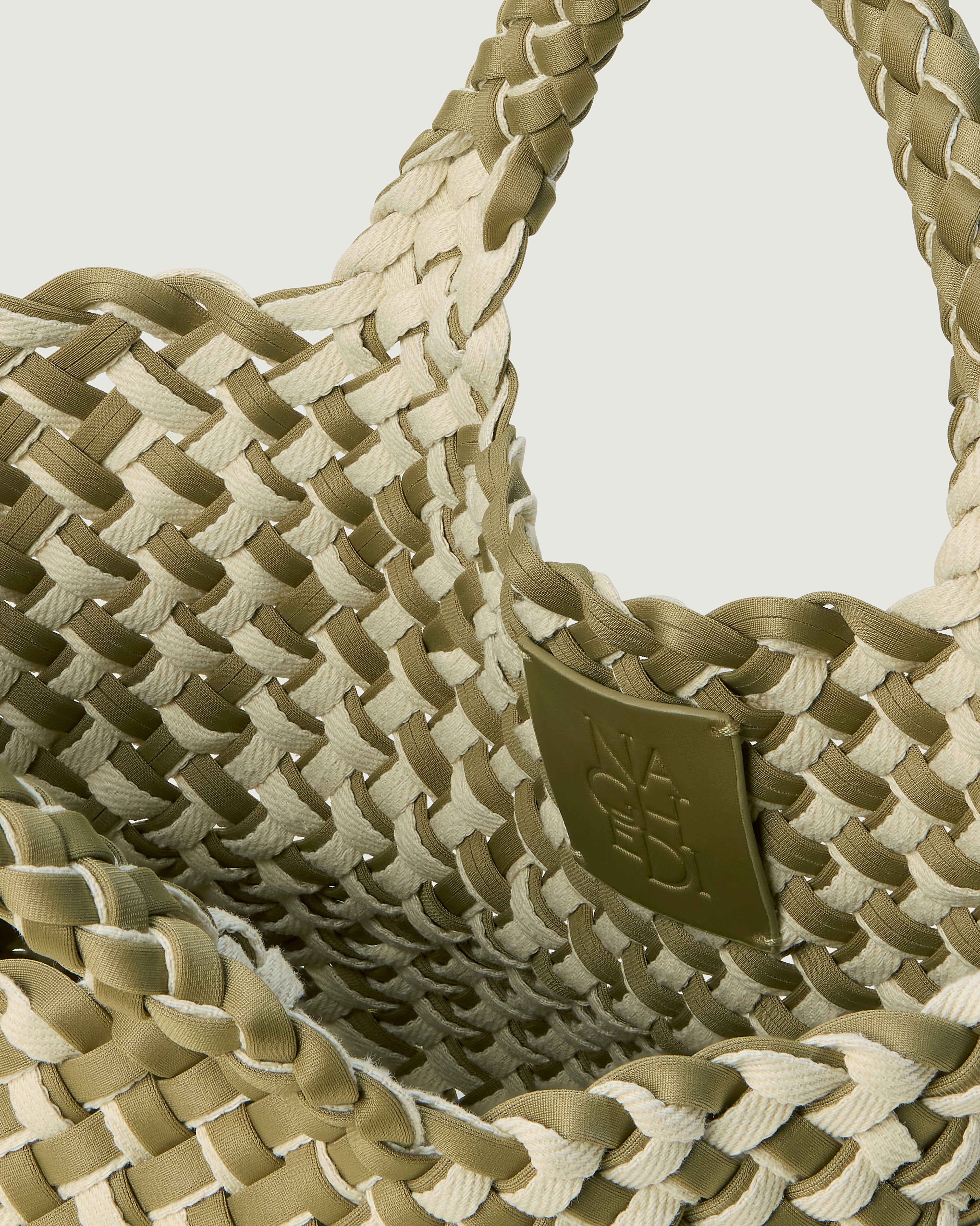 Interior close-up of St. Barths Tote in Oletta showing its open top, and unlined interior.