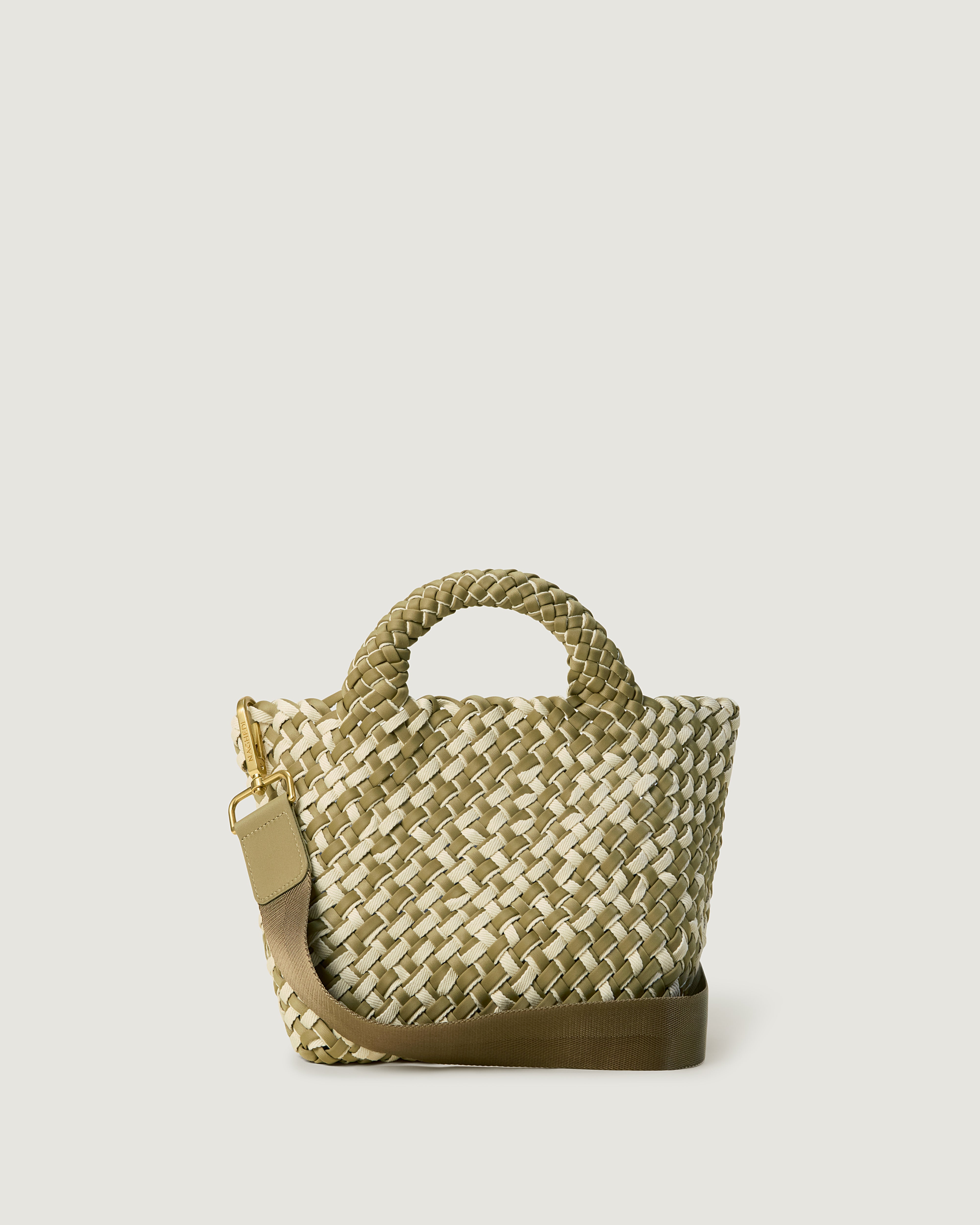 St. Barths Tote in Oletta, handwoven in muted bottle green neoprene with cream cotton. Featuring an open top, and woven top handles.