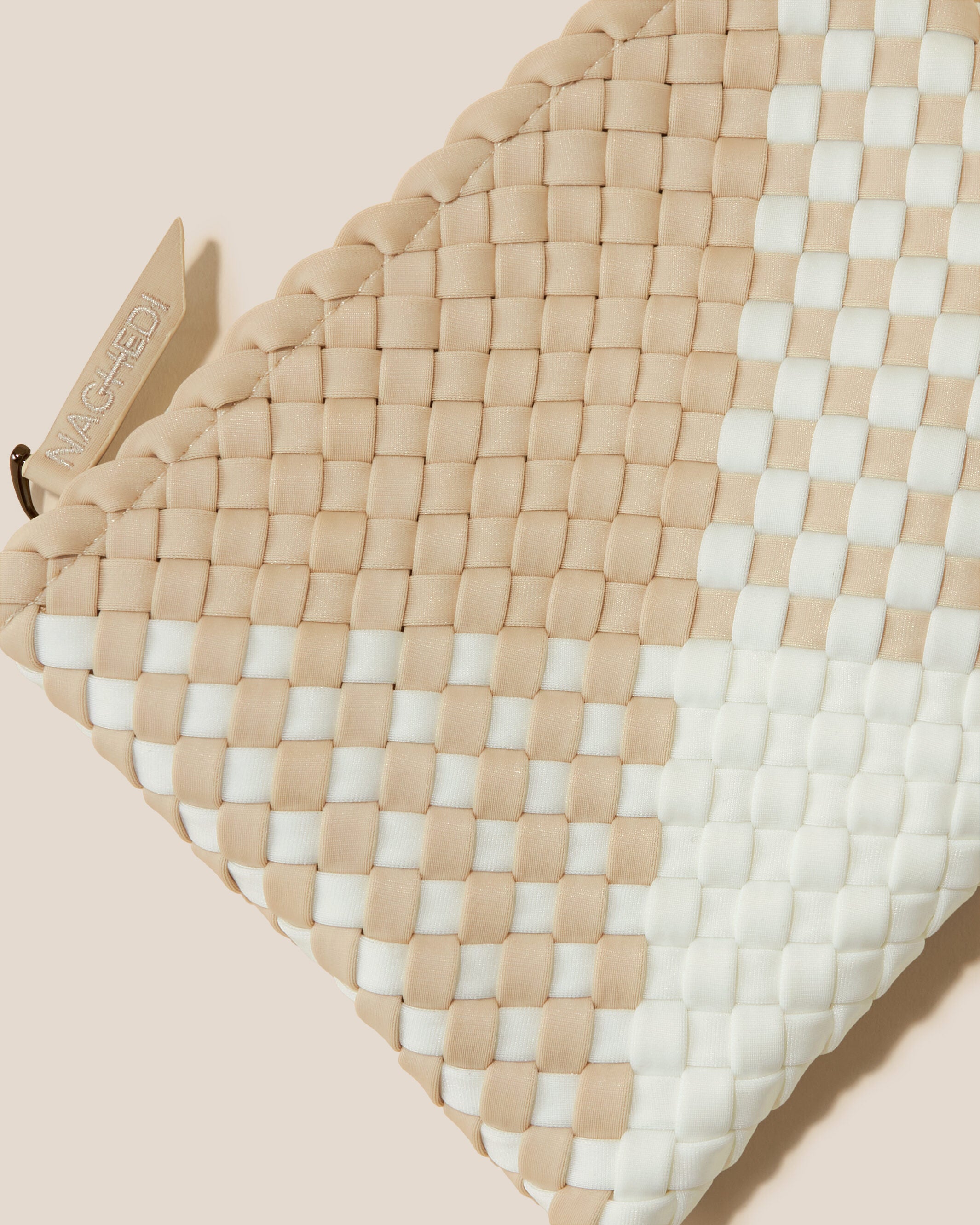 Close-up of included matching woven zippered pouch.