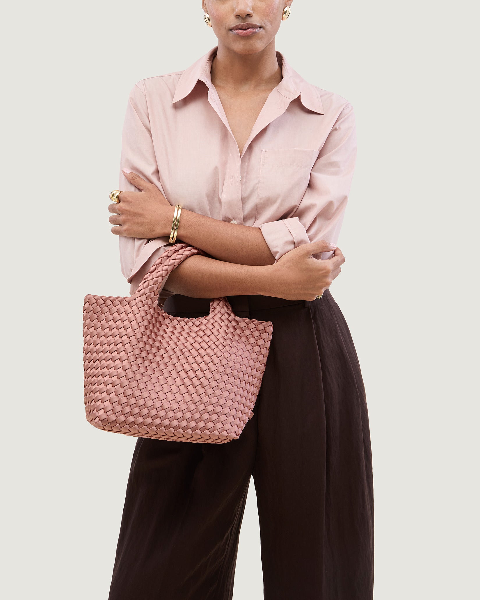 St. Barths Small Satin Tote Bag in Daphne shown on model to illustrate scale and soft silhouette.