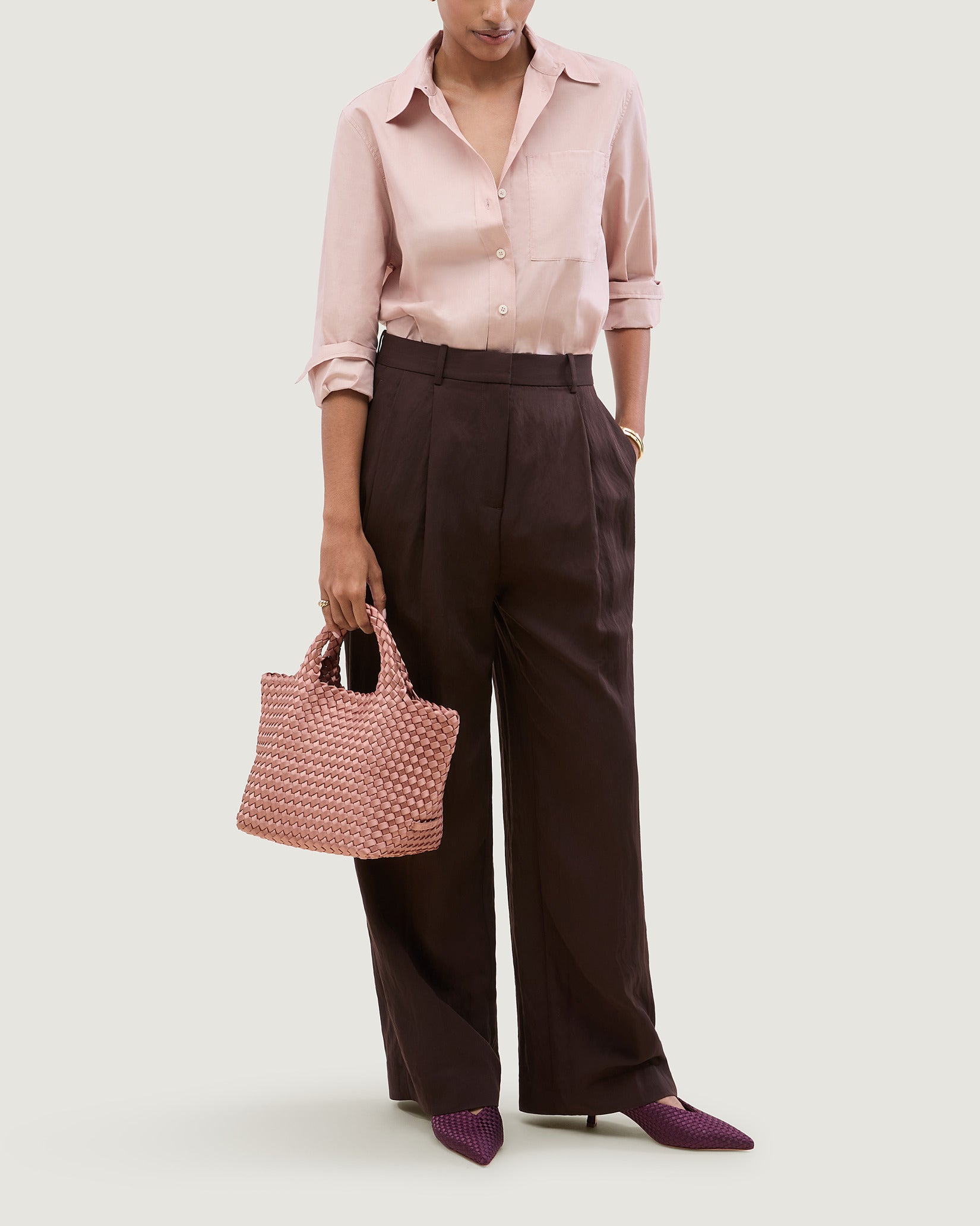 St. Barths Small Satin Tote Bag in Daphne shown on model to illustrate scale and soft silhouette.