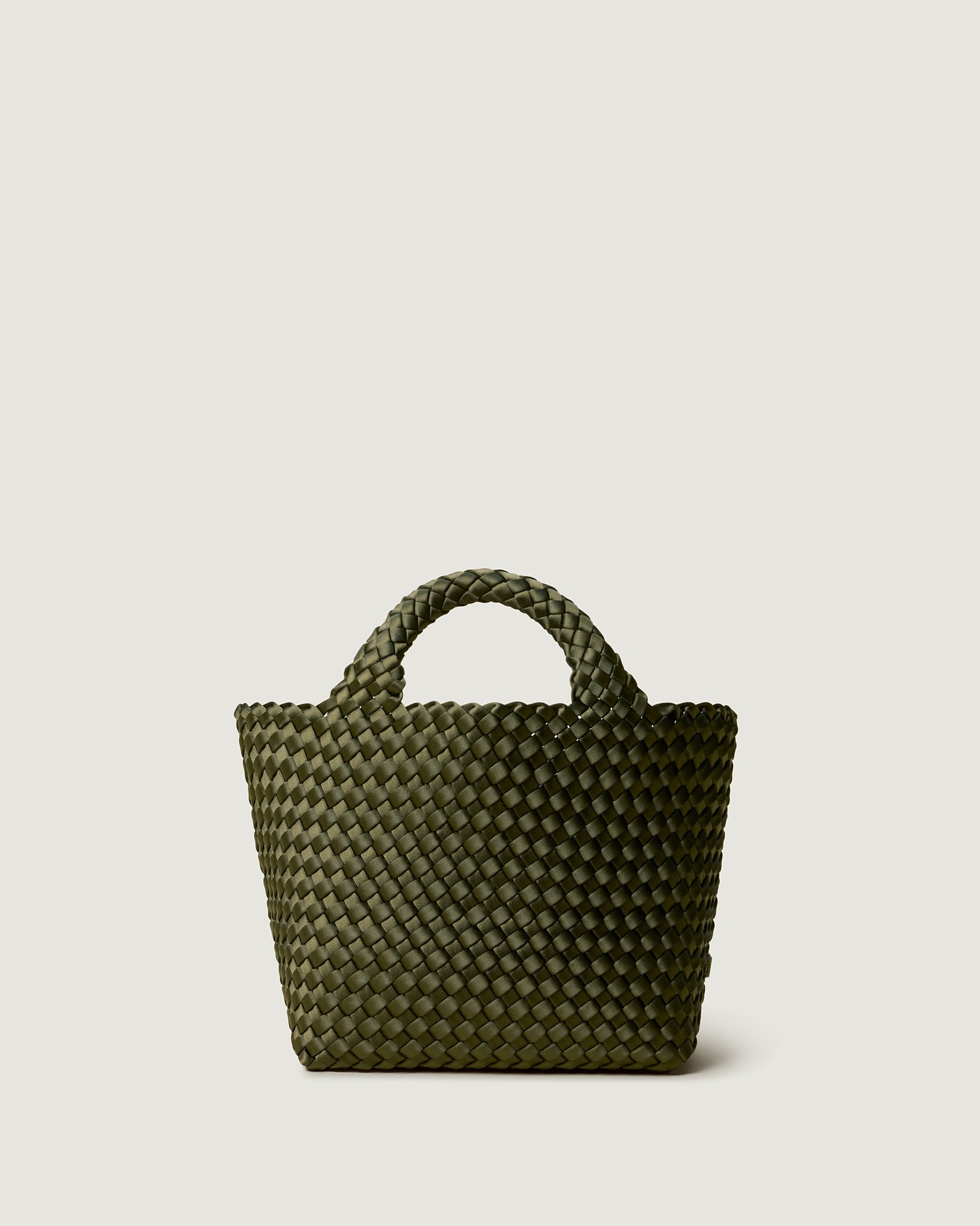 St. Barths Small Satin Tote Bag in Juniper, a forest green  tone, in handwoven neoprene featuring an open top, woven top handles, and detachable, adjustable nylon crossbody strap.