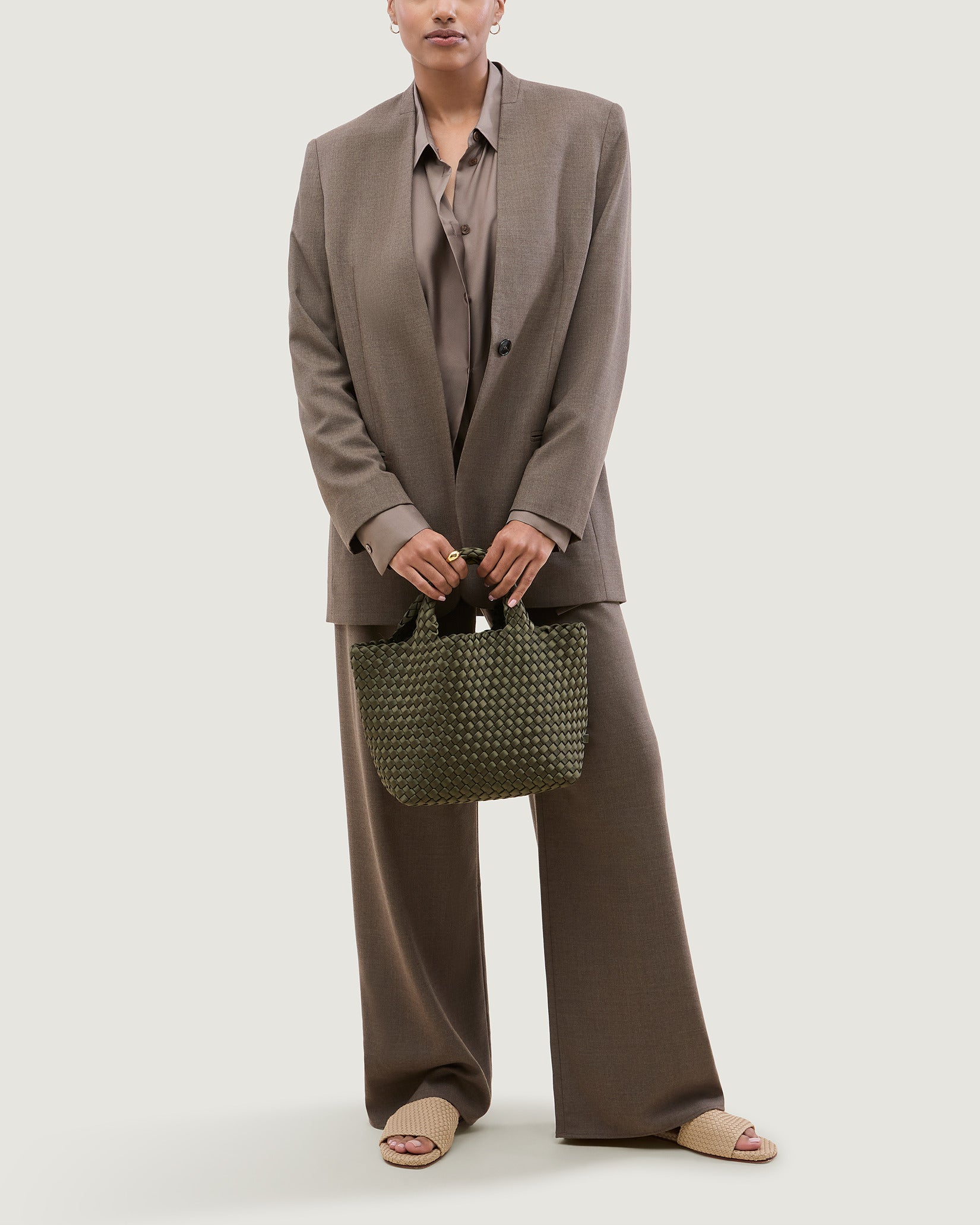 St. Barths Small Satin Tote Bag in Juniper shown on model to illustrate scale and soft silhouette.
