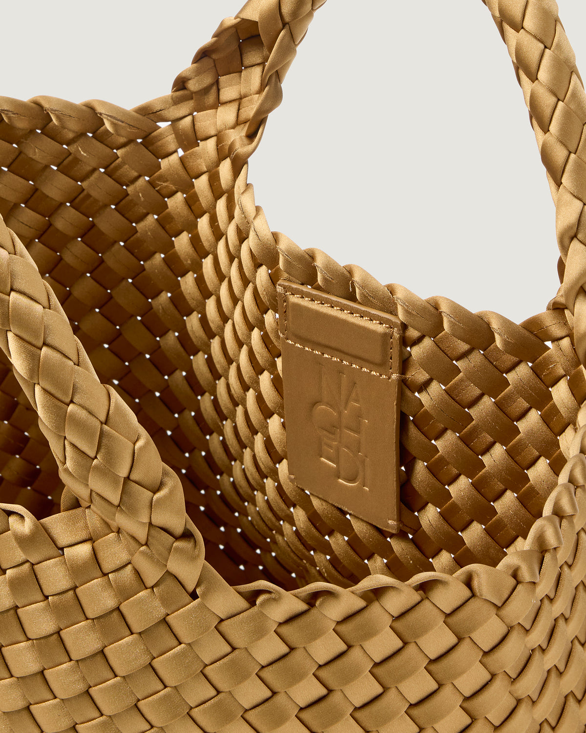 Interior close-up of St. Barths Tote in Luce showing its open top, magnetic closure, and unlined interior