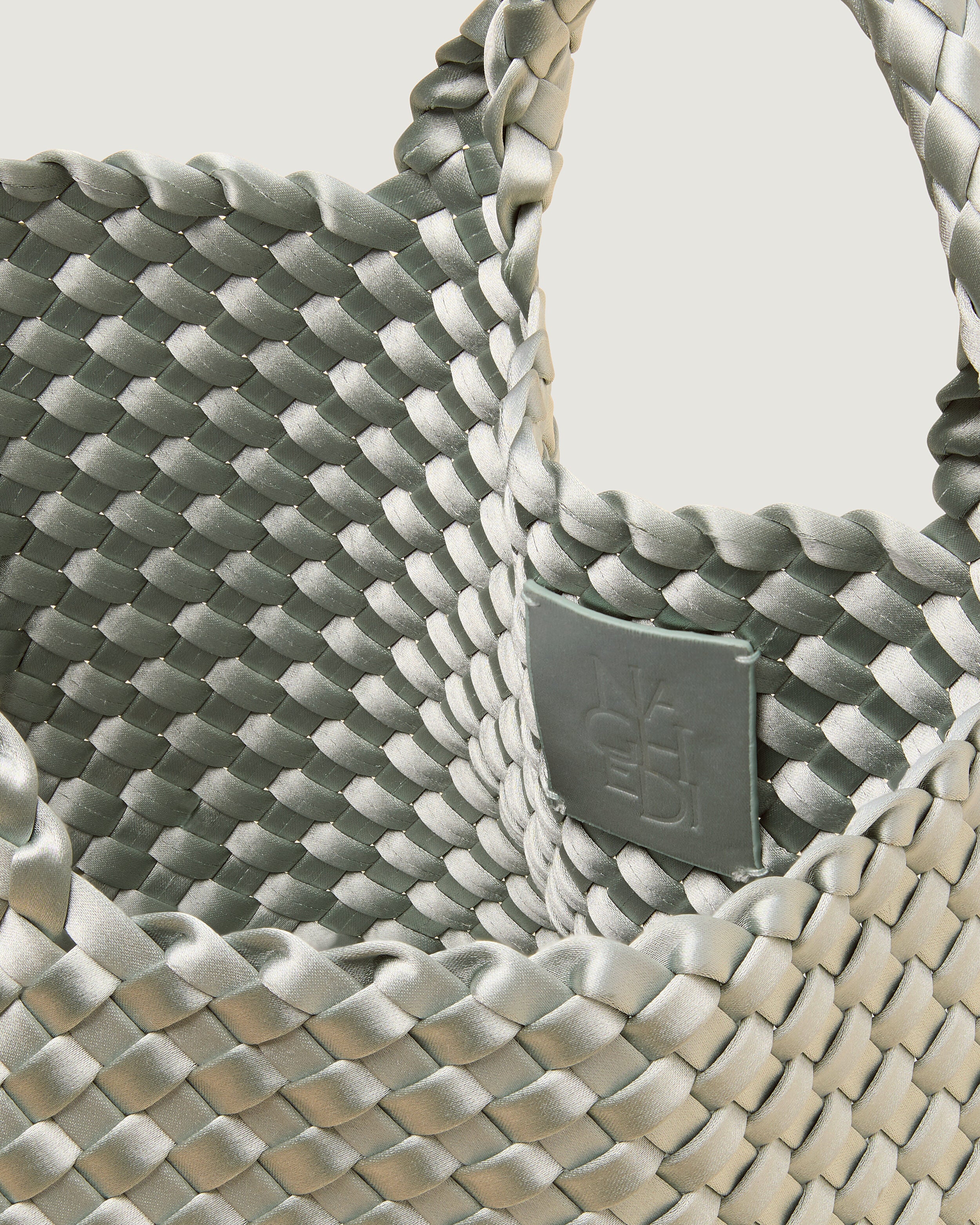 Interior close-up of St. Barths Tote in Wintergreen showing its open top, and unlined interior.