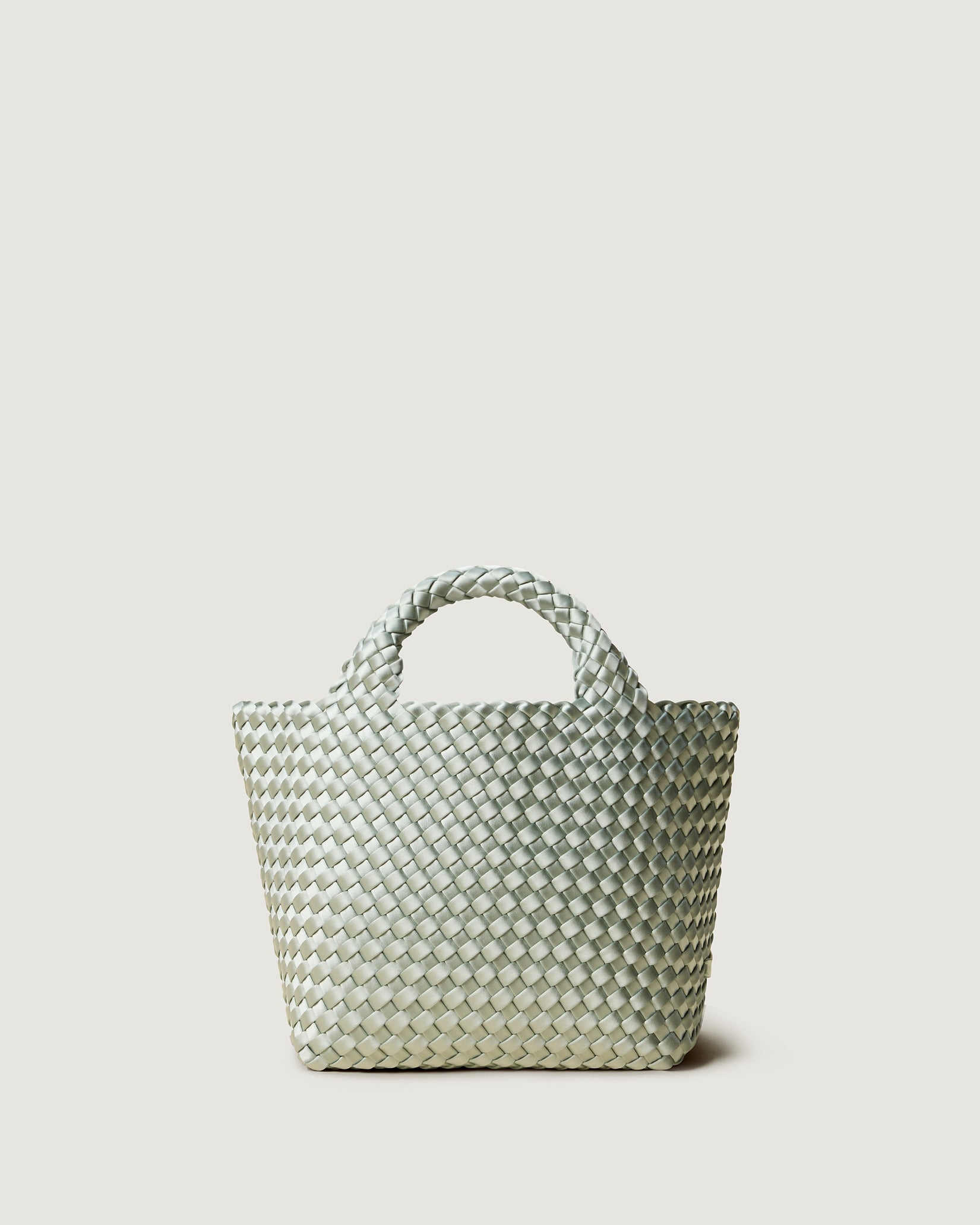 St. Barths Small Satin Tote Bag in Wintergreen, an aqua green tone, in handwoven neoprene featuring an open top, woven top handles, and detachable, adjustable nylon crossbody strap.