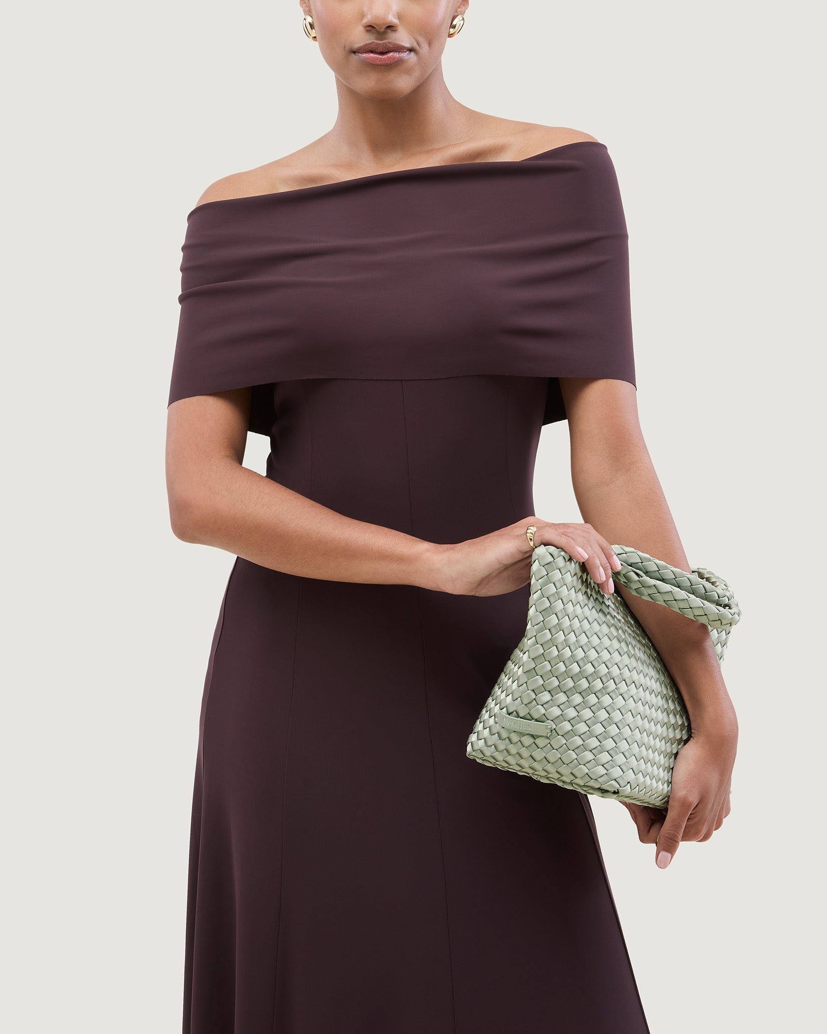 St. Barths Small Satin Tote Bag in Wintergreen shown on model to illustrate scale and soft silhouette.