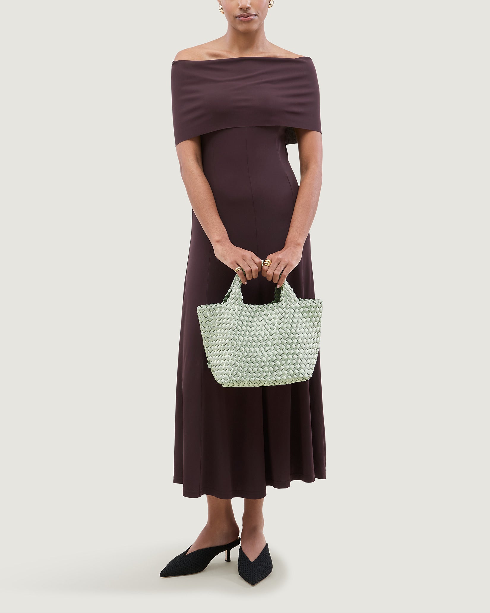 St. Barths Small Satin Tote Bag in Wintergreen shown on model to illustrate scale and soft silhouette.