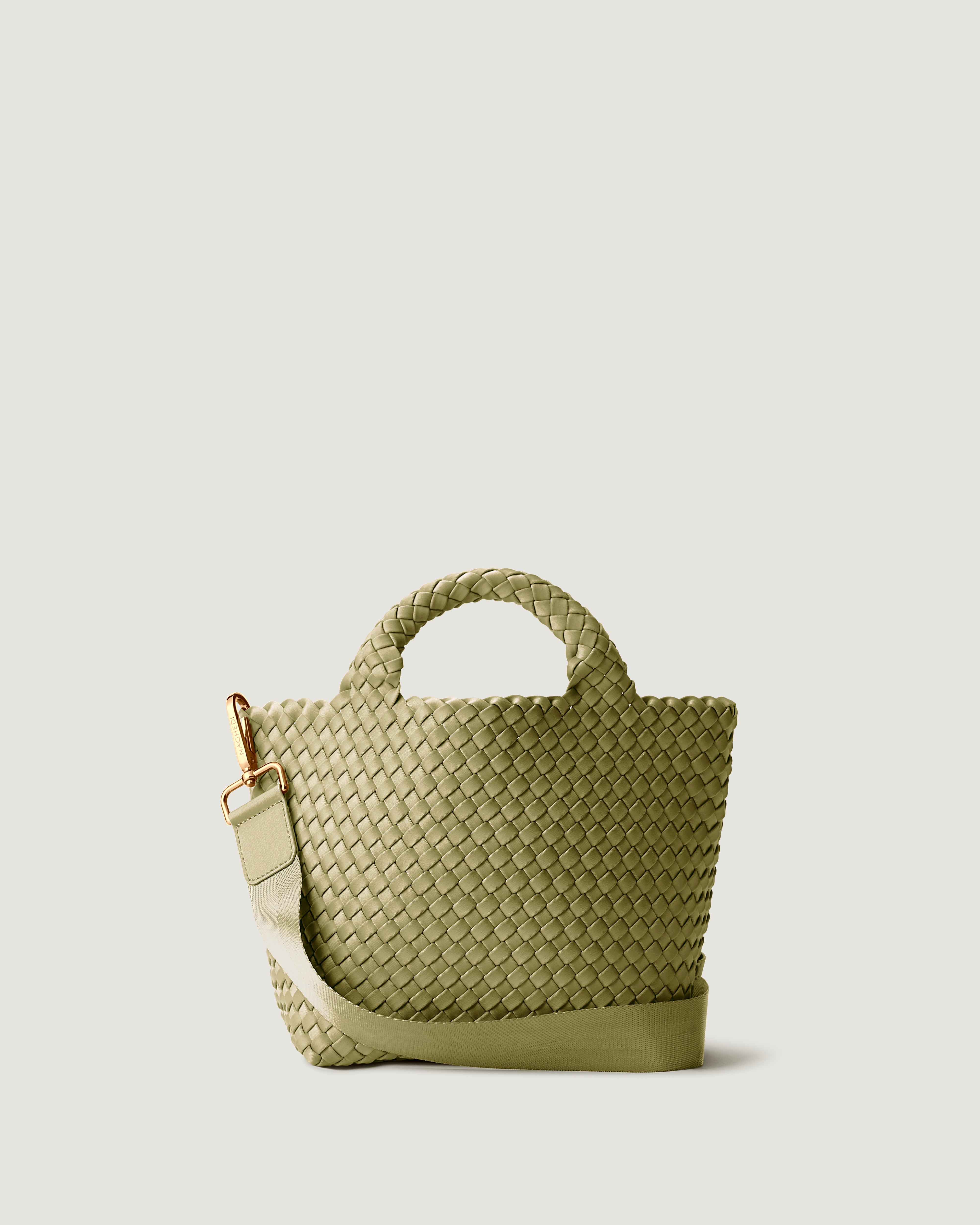 St. Barths Tote in Bottle Green, handwoven in muted green neoprene. Featuring an open top, and woven top handles.