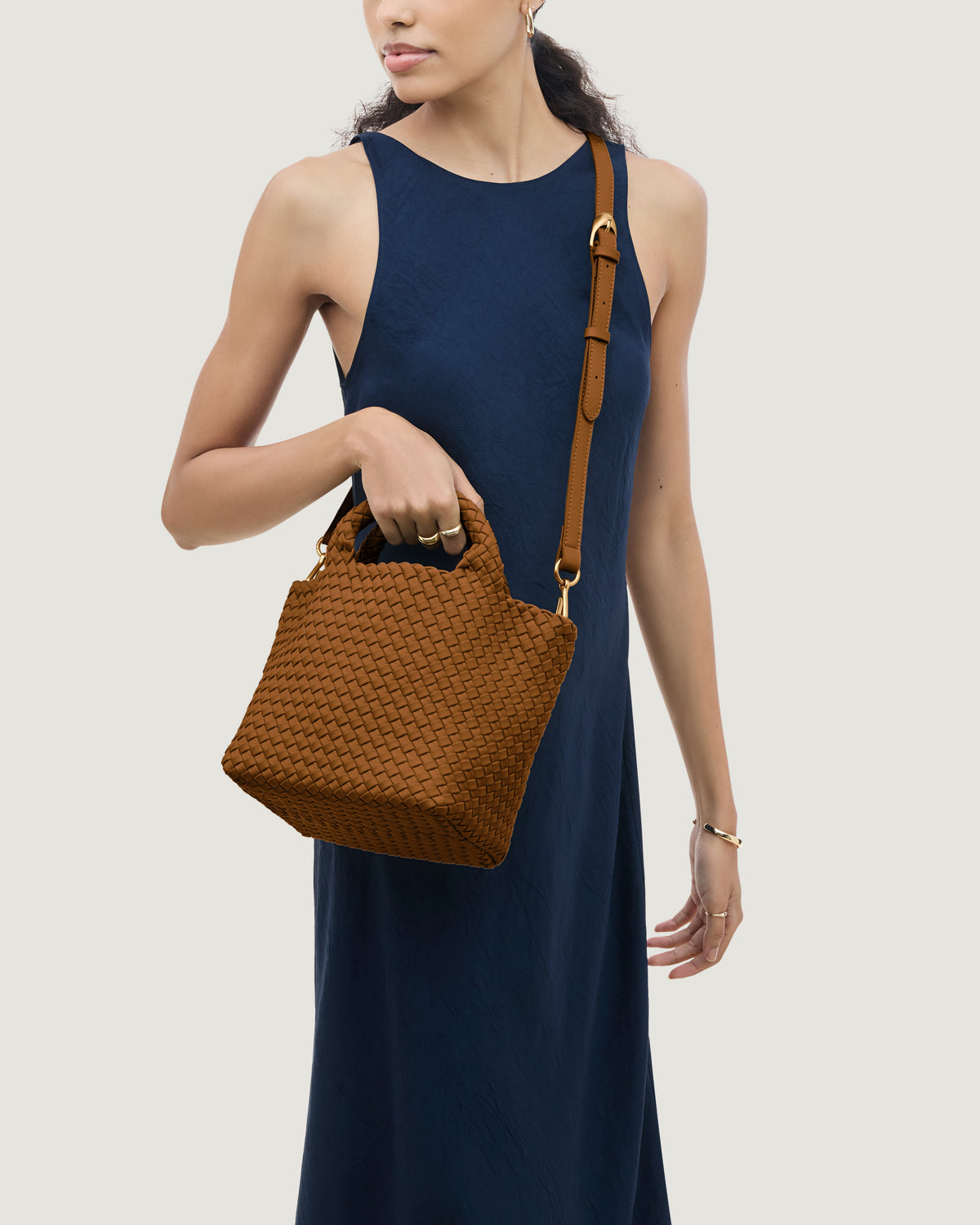 St. Barths Tote in Teak shown on model to illustrate scale and soft silhouette.