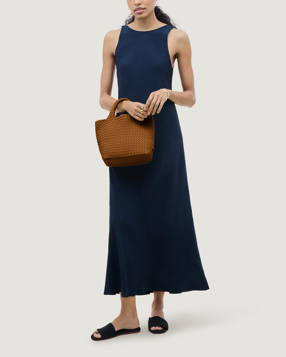 St. Barths Tote in Teak shown on model to illustrate scale and soft silhouette.