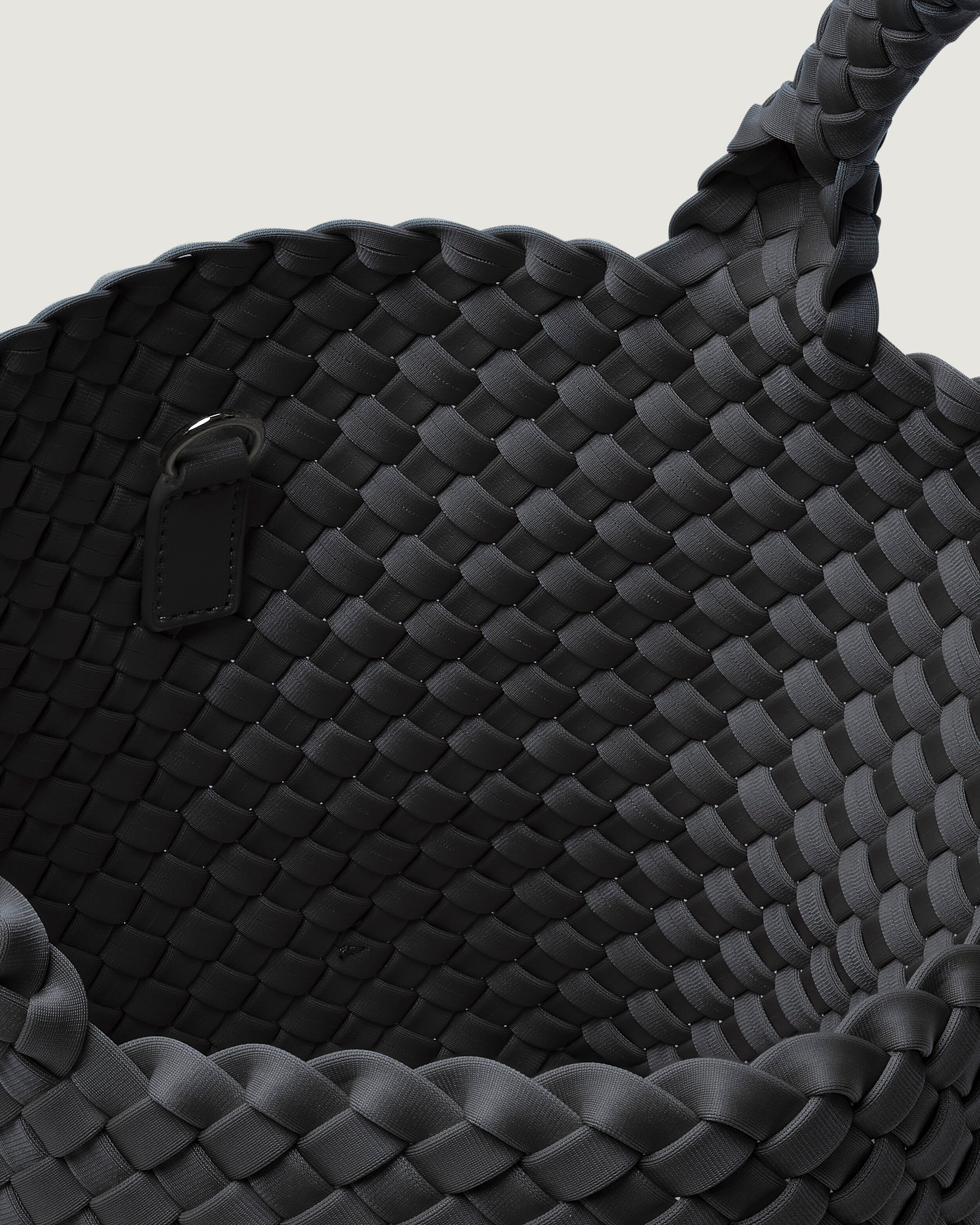 Interior close-up of St. Barths Tote in Ash showing its open top, and unlined interior.