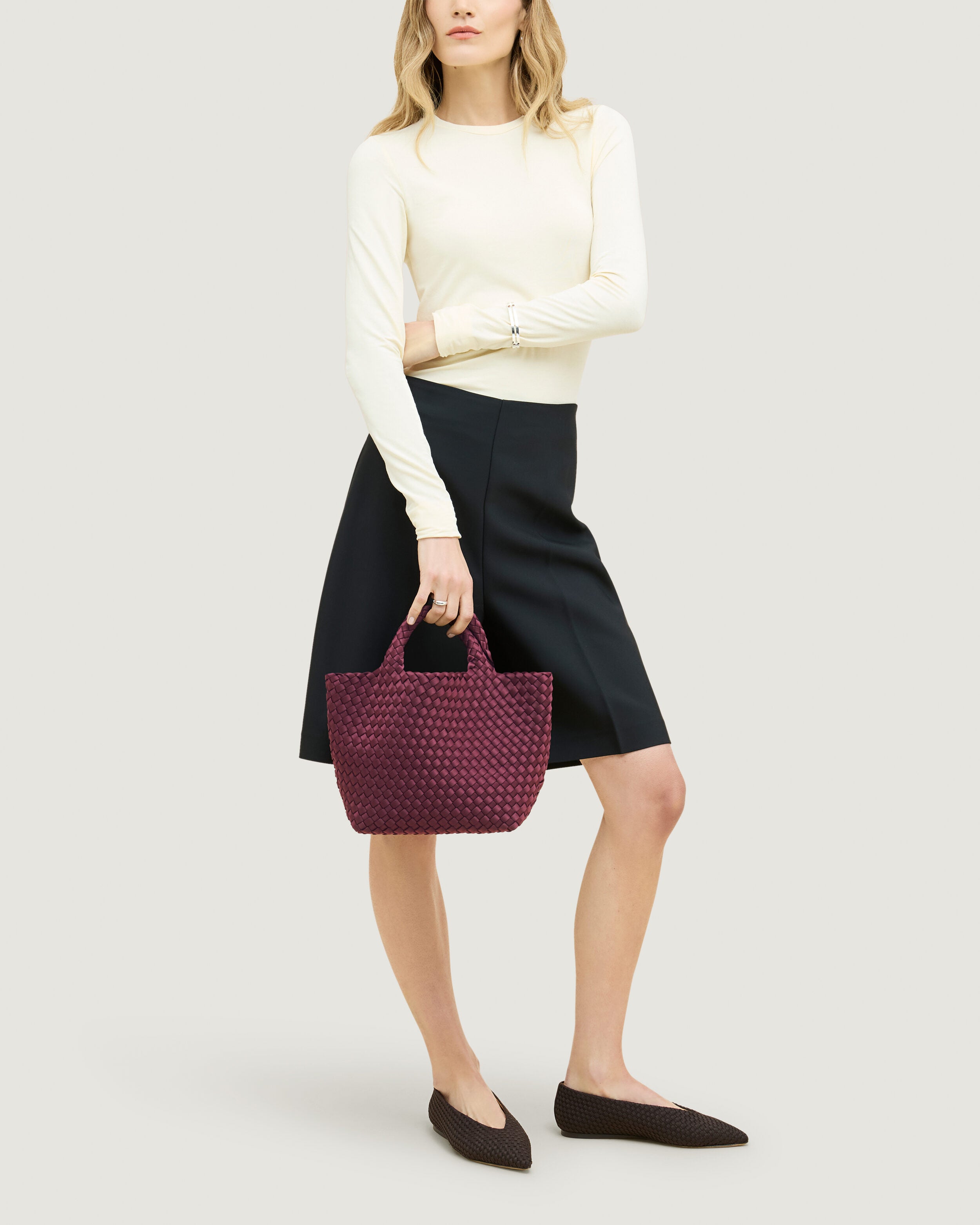St. Barths Tote in Bordeaux shown on model to illustrate scale and soft silhouette.