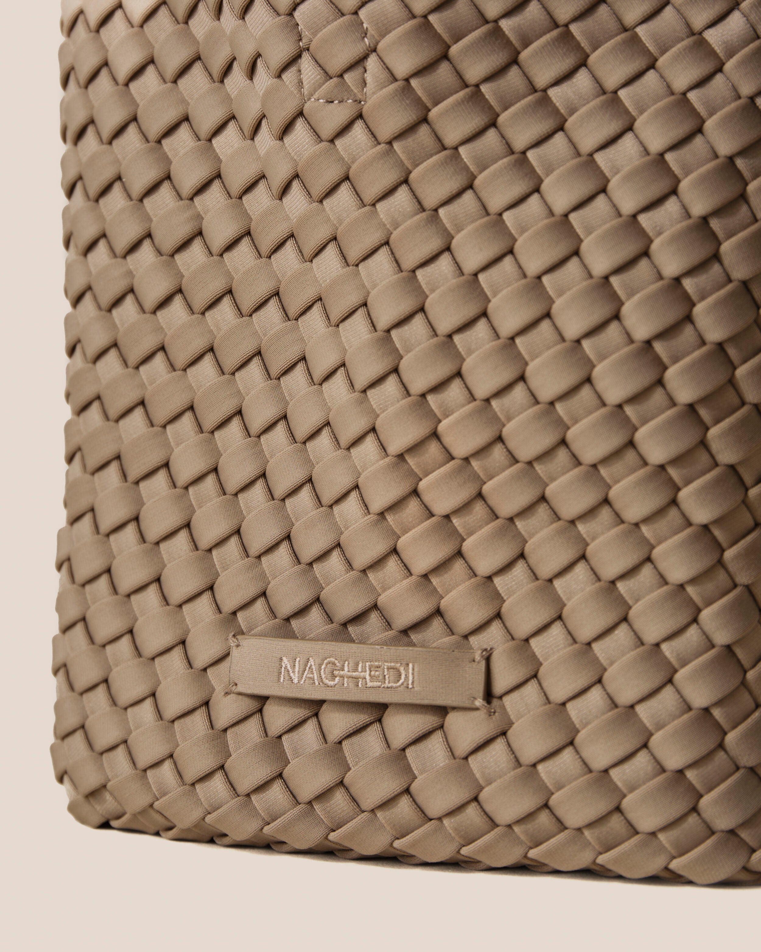 Close-up of stamped NAGHEDI logo on St. Barths Tote in Cashmere.