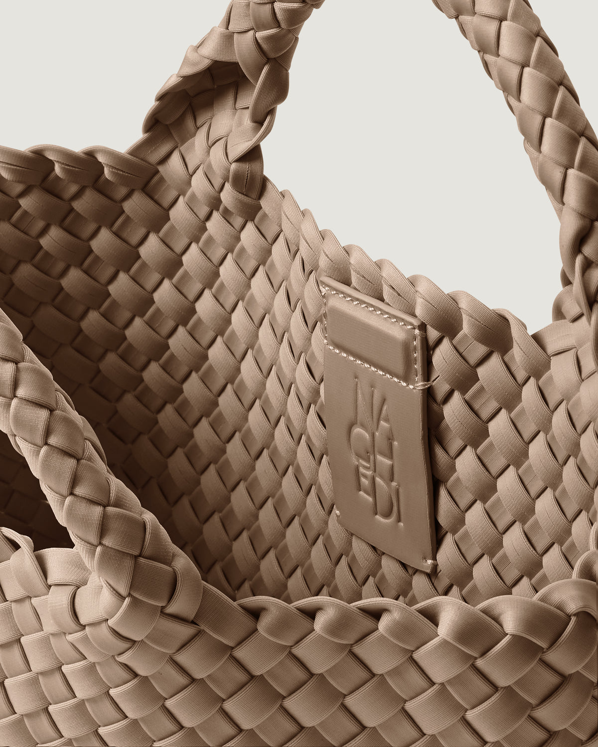 Interior close-up of St. Barths Tote in Cashmere showing its magnetic snap closure, and unlined interior.
