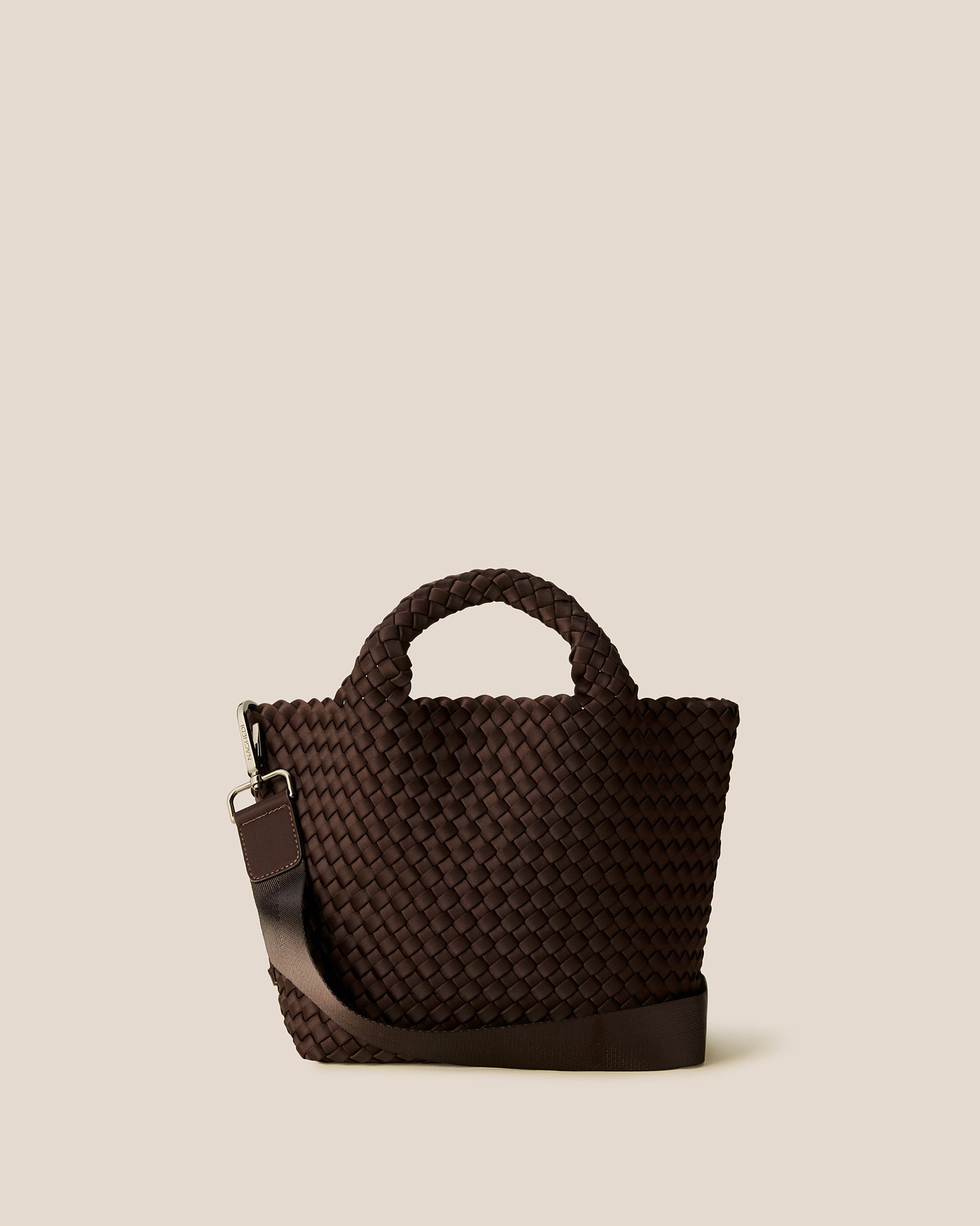 St. Barths Small Tote Bag in Chocolate, a dark chocolate brown tone, in handwoven neoprene featuring an open top, woven top handles, and detachable, adjustable nylon crossbody strap.