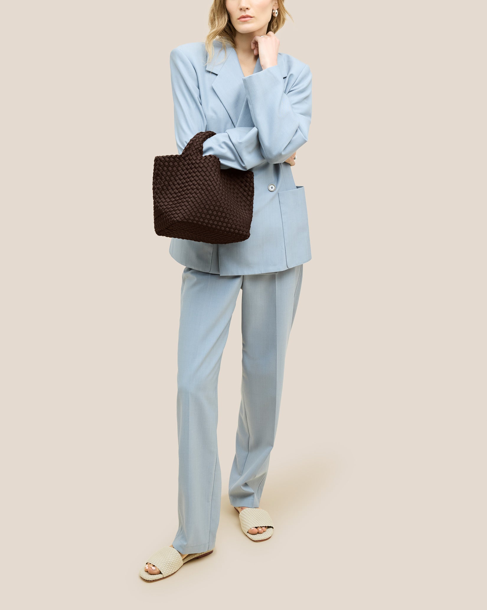 St. Barths Small Tote Bag in Chocolate shown on model to illustrate scale and soft silhouette.