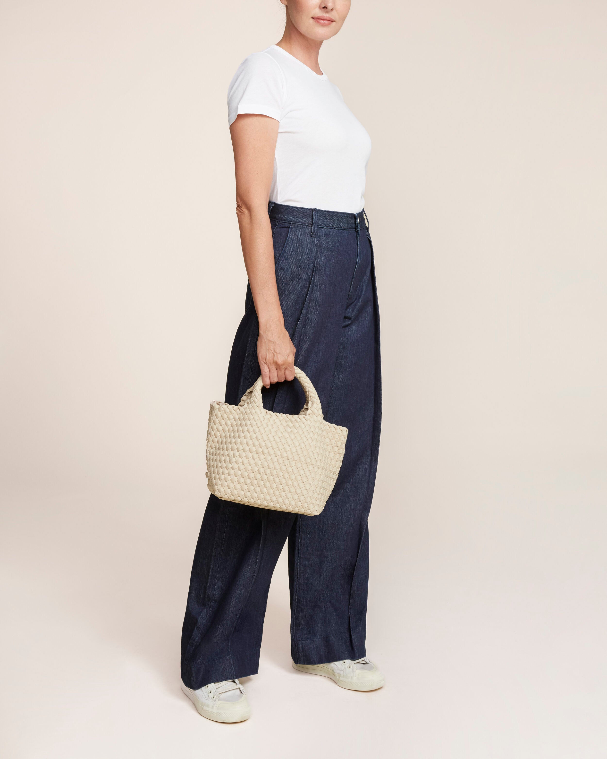 St. Barths Tote in Ecru shown on model to illustrate scale and soft silhouette.