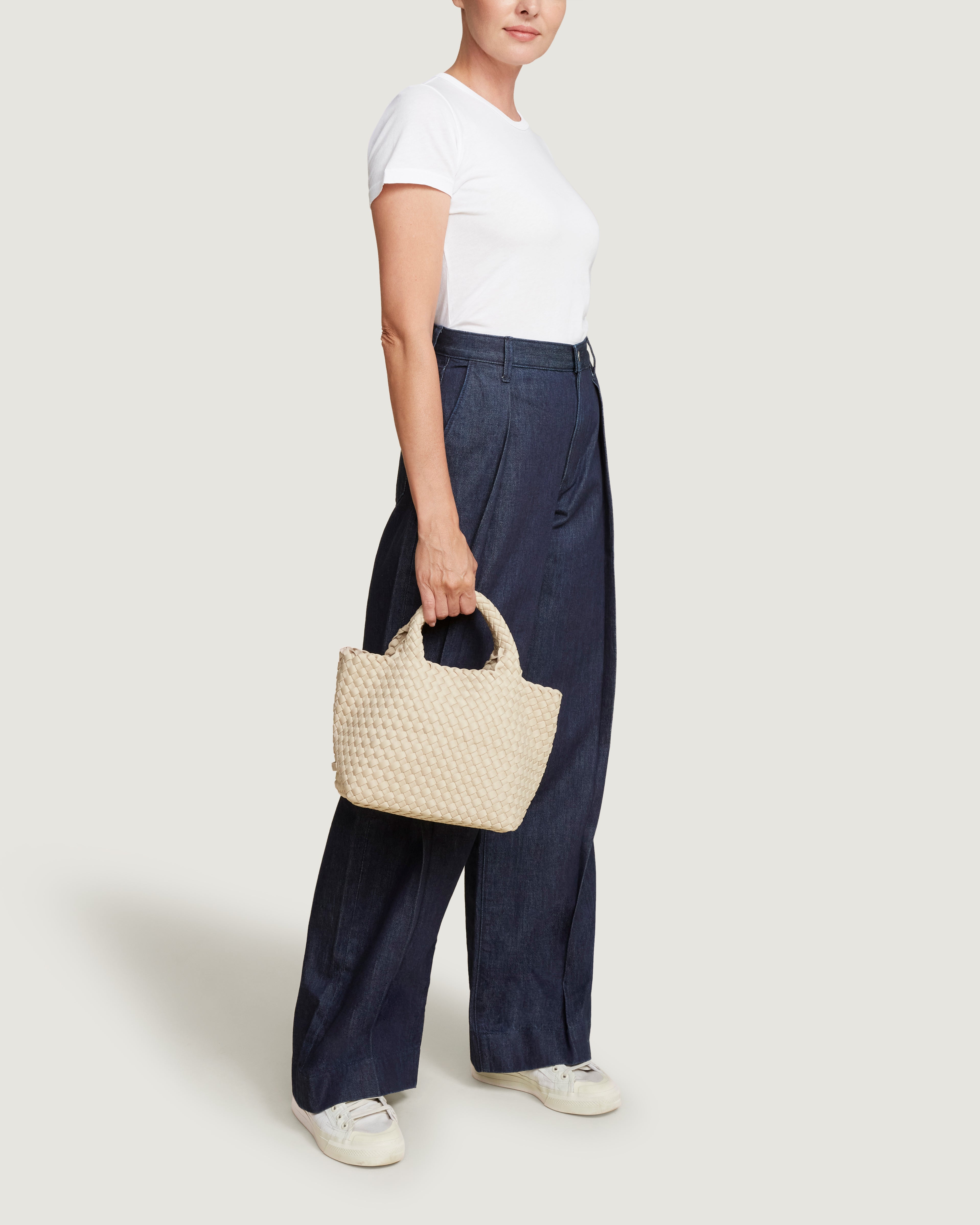 St. Barths Tote in Ecru shown on model to illustrate scale and soft silhouette.