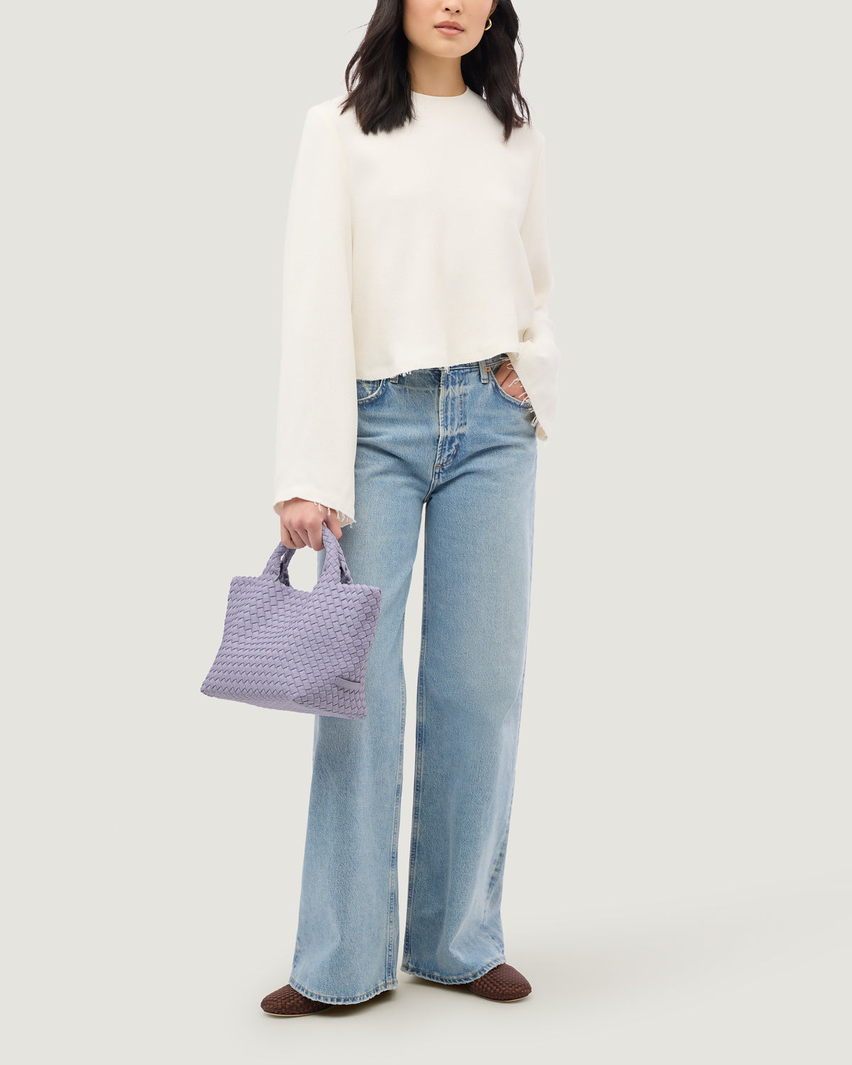 St. Barths Tote in Lilac shown on model to illustrate scale and soft silhouette.