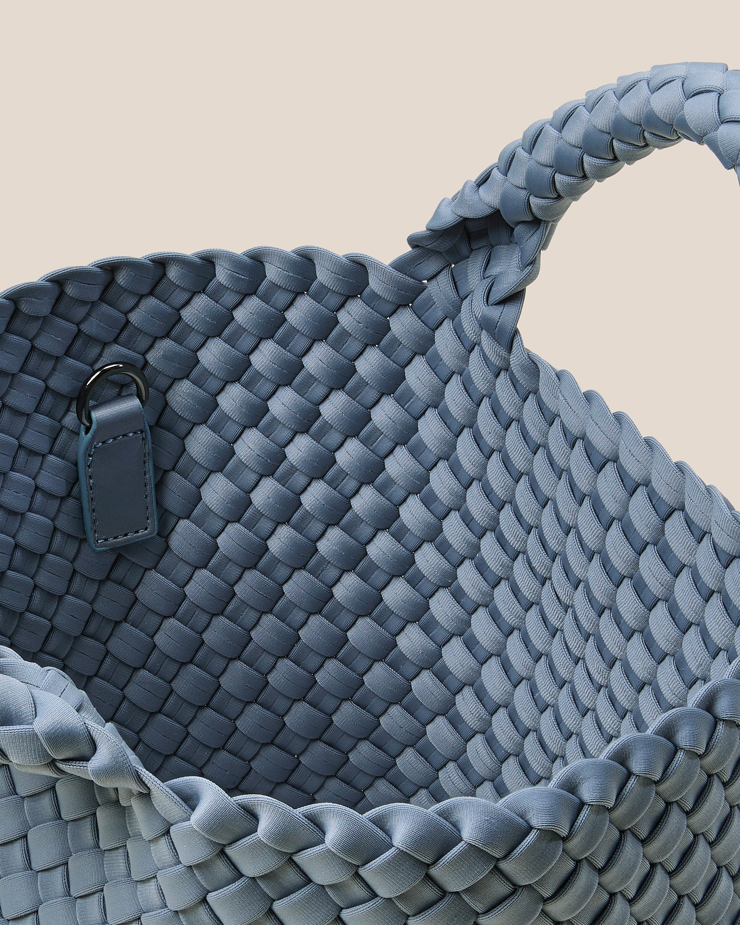 Interior close-up of St. Barths Tote in Nova showing its open top, and unlined interior.