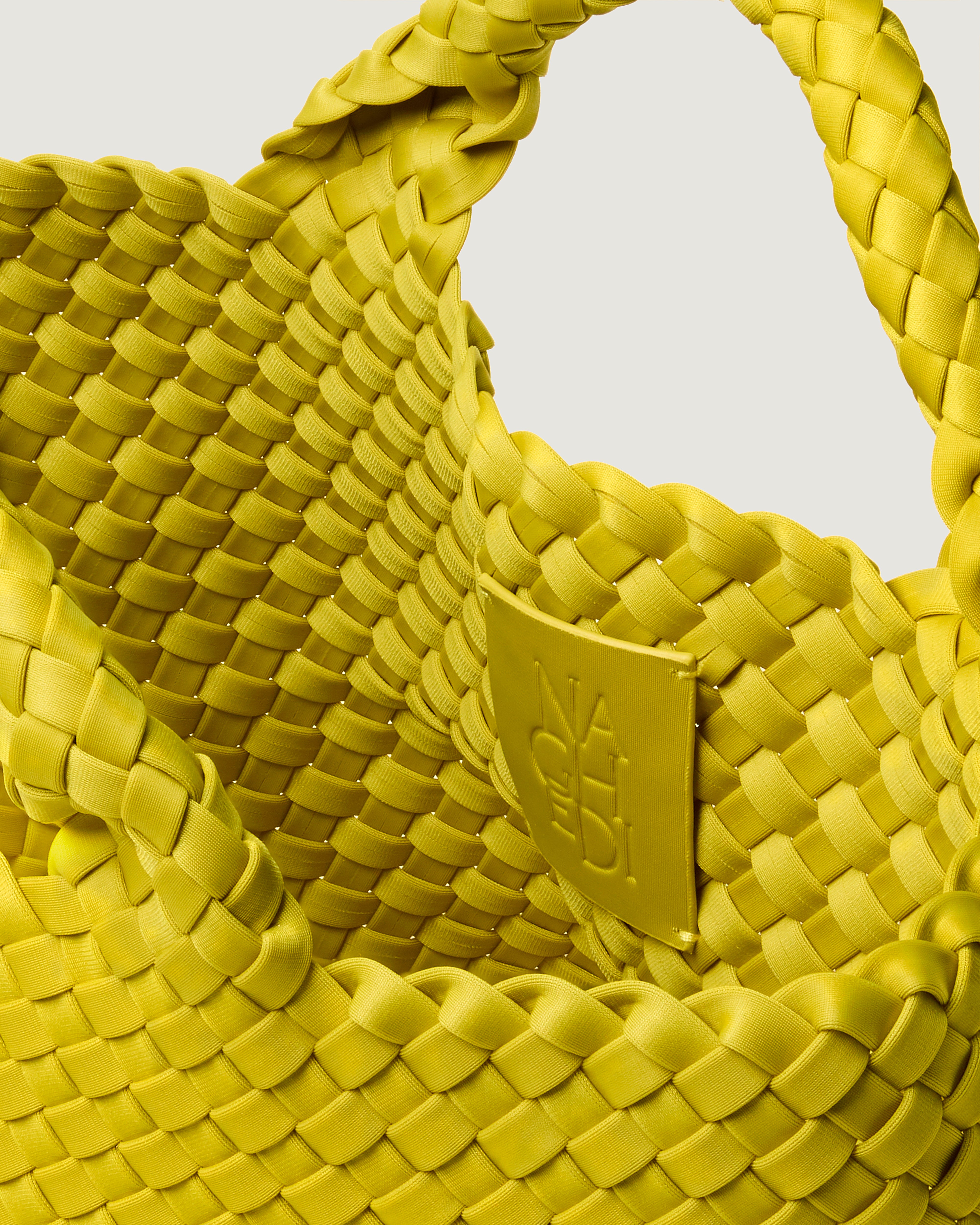NAGHEDI | Handwoven Neoprene Bags & Shoes
